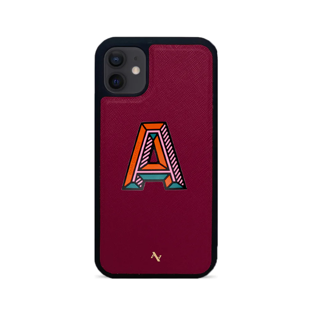 MAAD Stickers Alphabet for iPhone 12 Mini in vibrant red, showcasing customizable letters on a sleek phone case.