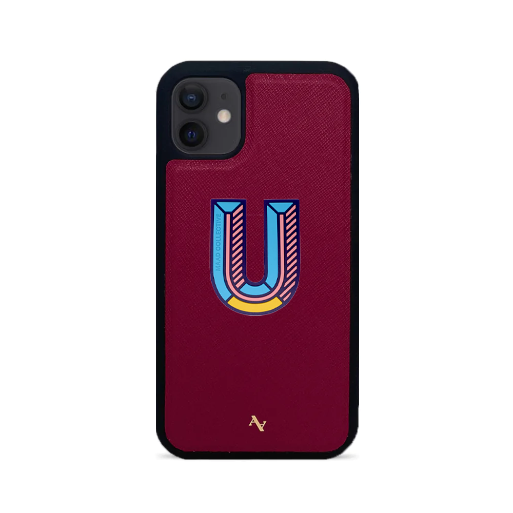 MAAD Stickers Alphabet for iPhone 12 Mini in vibrant red, showcasing customizable letters on a sleek phone case.