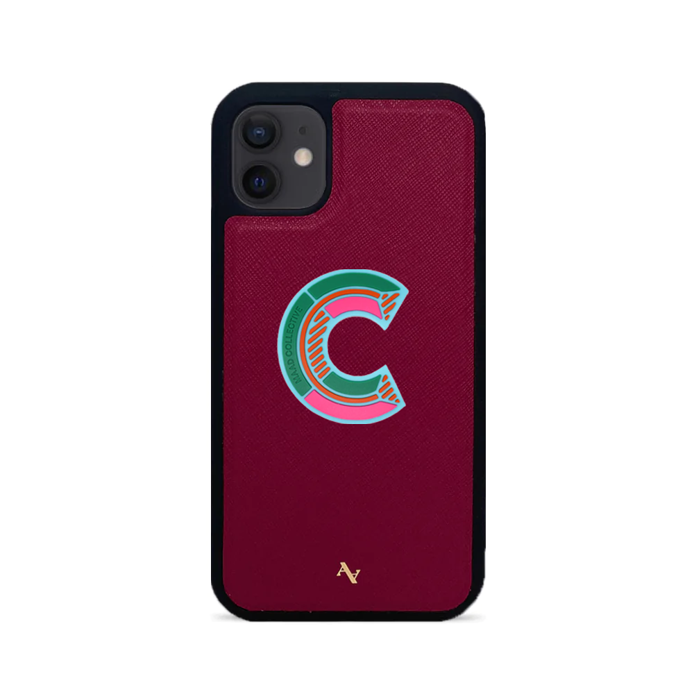 MAAD Stickers Alphabet for iPhone 12 Mini in vibrant red, showcasing customizable letters on a sleek phone case.