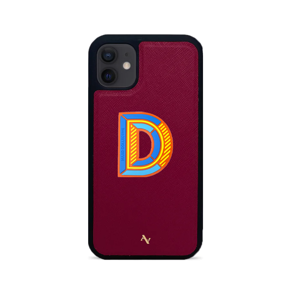 MAAD Stickers Alphabet for iPhone 12 Mini in vibrant red, showcasing customizable letters on a sleek phone case.