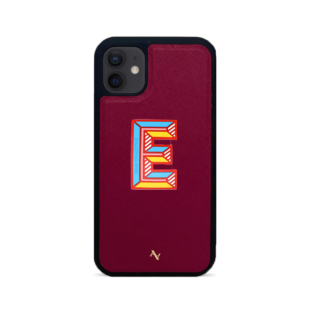 MAAD Stickers Alphabet for iPhone 12 Mini in vibrant red, showcasing customizable letters on a sleek phone case.