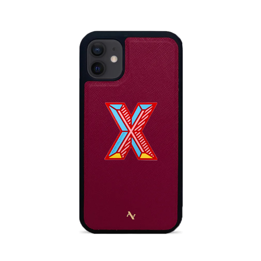 MAAD Stickers Alphabet for iPhone 12 in vibrant colors, showcasing customizable letters and a protective case.