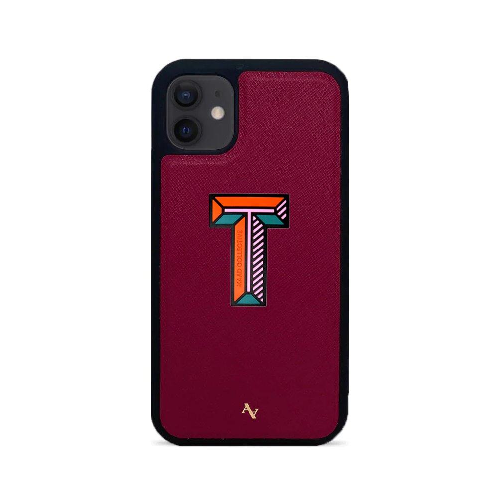 MAAD Stickers Alphabet for iPhone 12 in vibrant colors, showcasing customizable letters and a protective case.