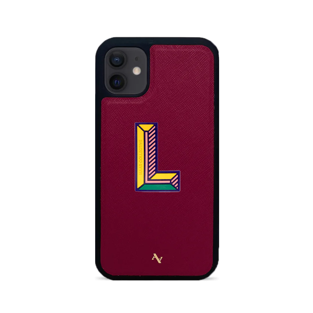 MAAD Stickers Alphabet for iPhone 12 in vibrant colors, showcasing customizable letters and a protective case.
