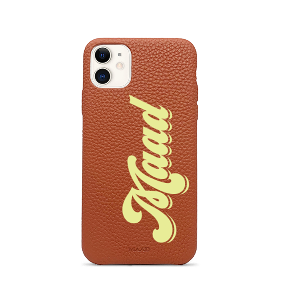 Stylish terracotta pebble leather iPhone 11 case with personalization options, showcasing earthy tones and minimalist design.