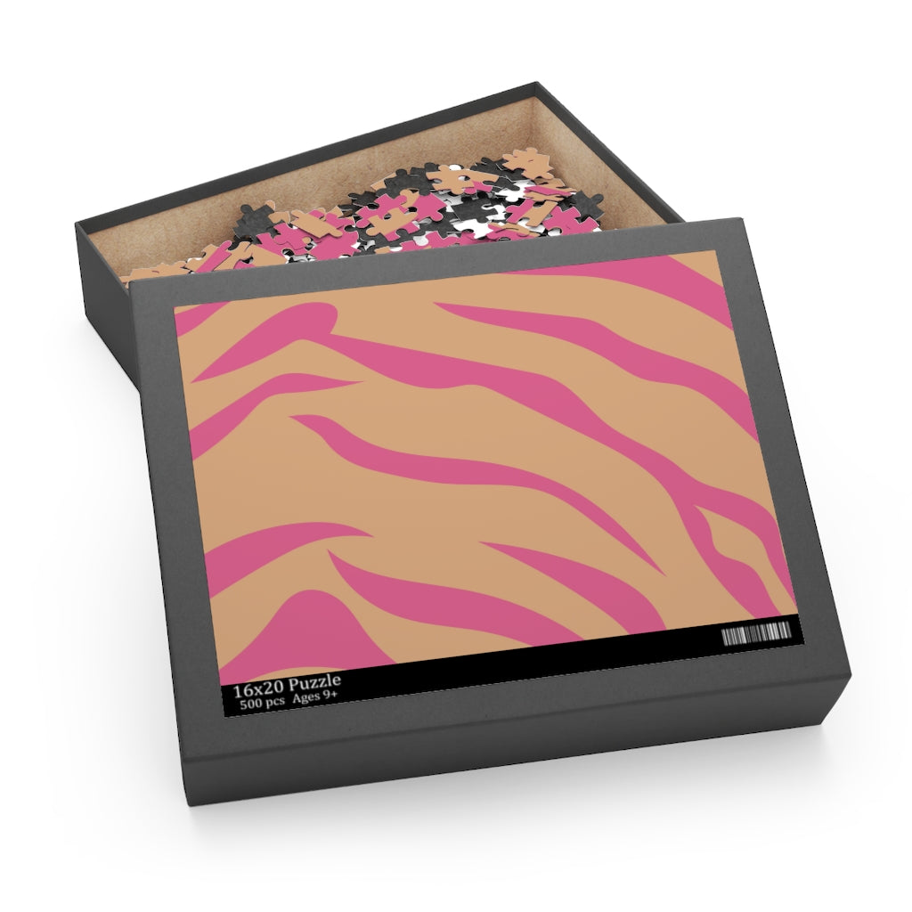 A vibrant 500-piece jigsaw puzzle featuring pink leopard stripes, showcasing high-quality chipboard pieces in a gift-ready box.