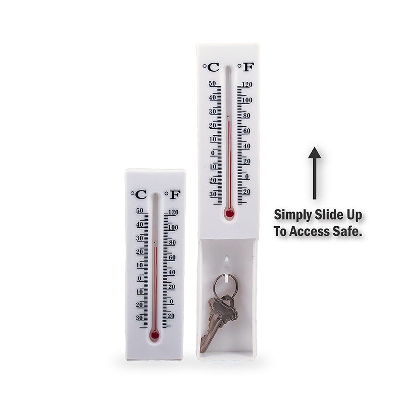 A Secret Safe Indoor/Outdoor Thermometer designed to hide valuables, featuring a slide open compartment and dual hanging slots.