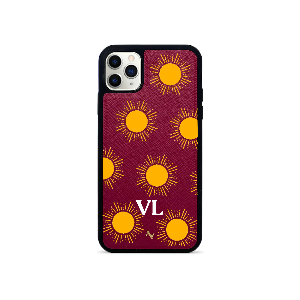 Stylish red leather case for iPhone 11 Pro Max with soft rubber edges and personalized monogram options.