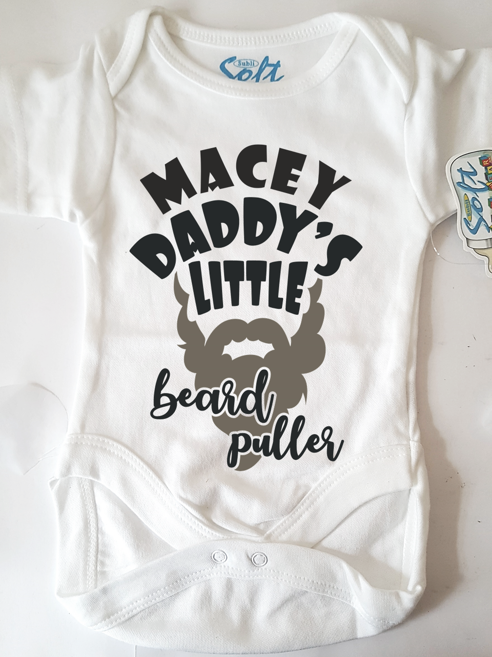 Bearded Daddy Personalised Babygrow in soft polyester fabric, featuring a humorous design perfect for new dads.