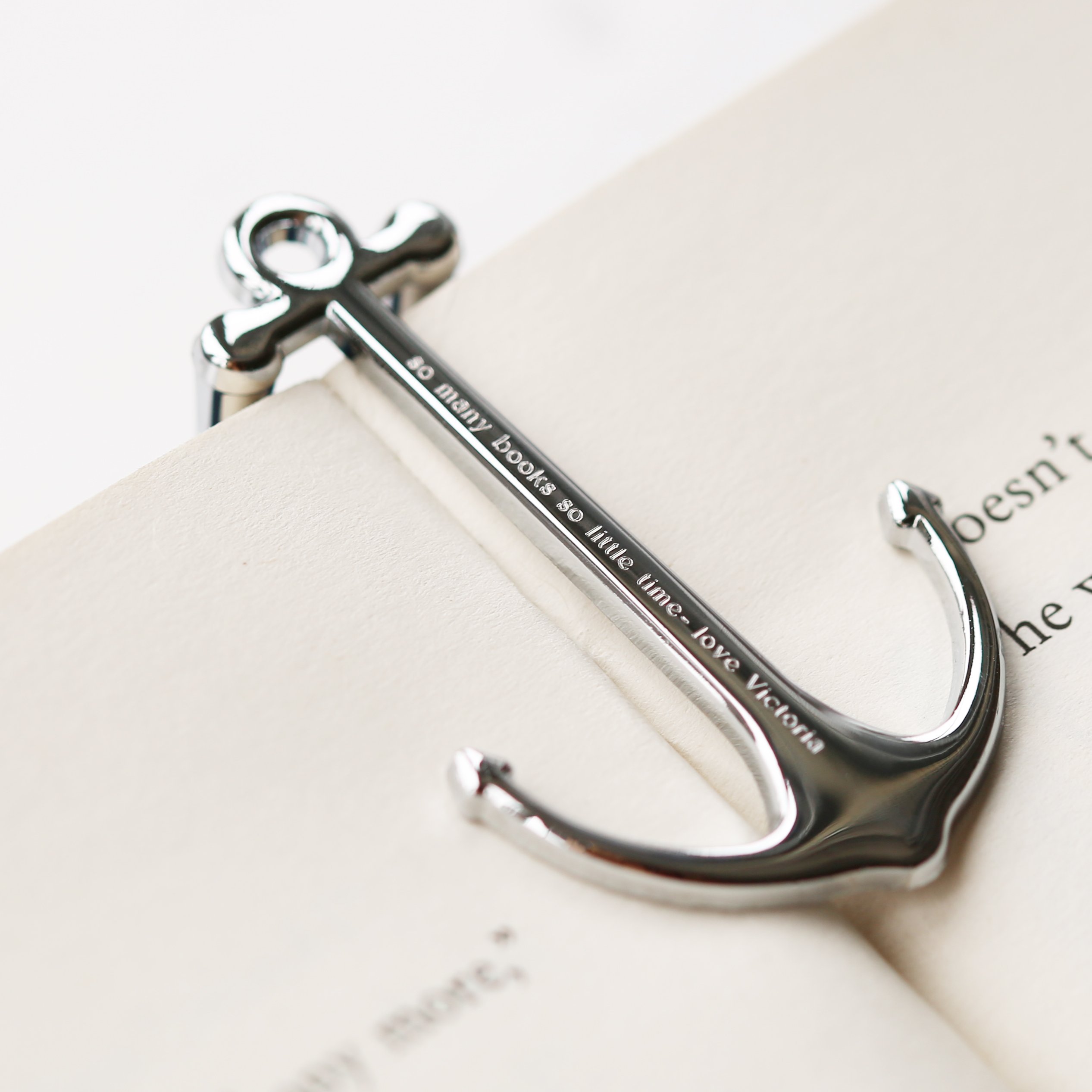 Personalised Silver & Black Book Anchor, elegantly designed with a modern font engraving, perfect for holding books open.