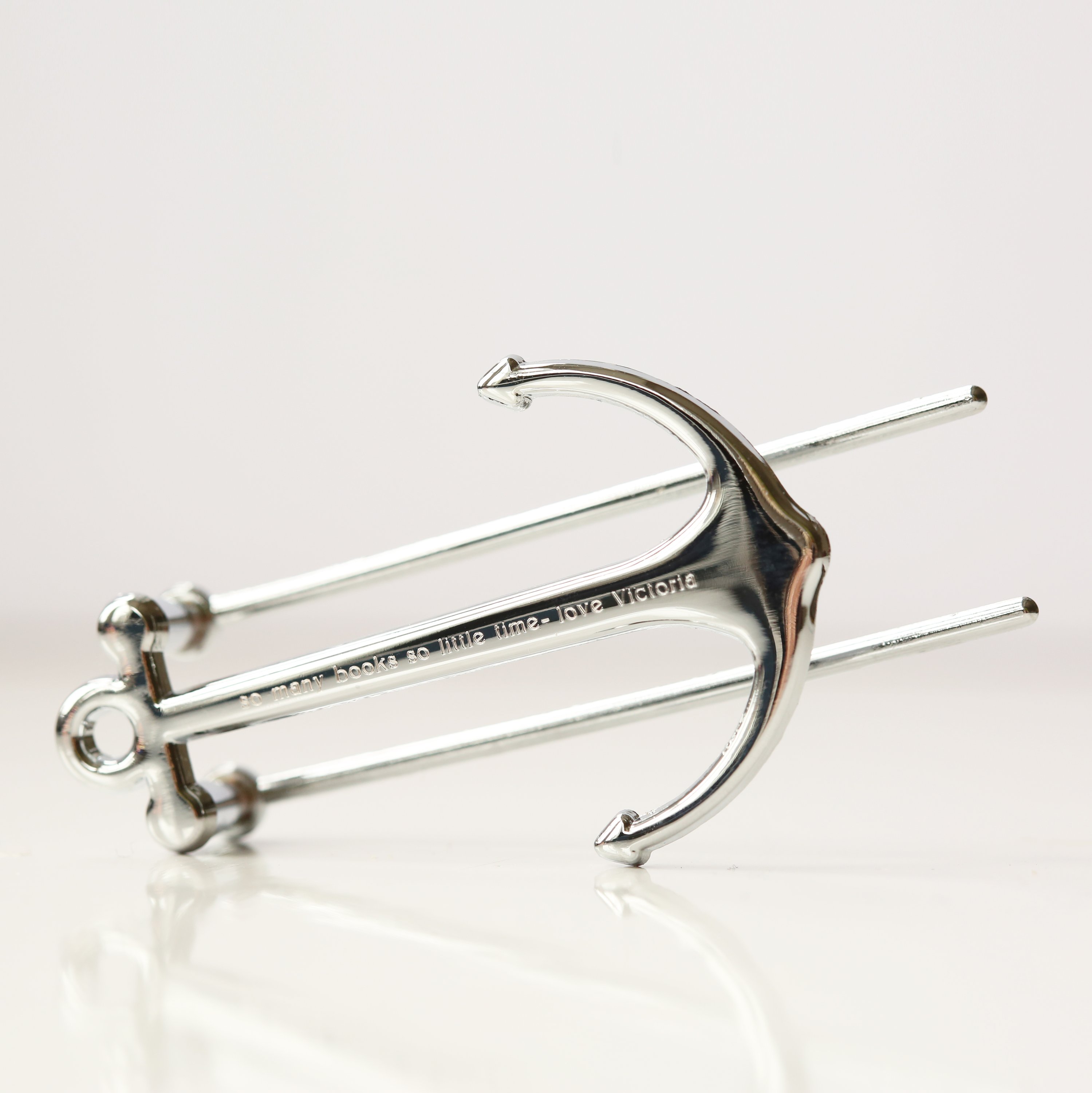 Personalised Silver & Black Book Anchor, elegantly designed with a modern font engraving, perfect for holding books open.