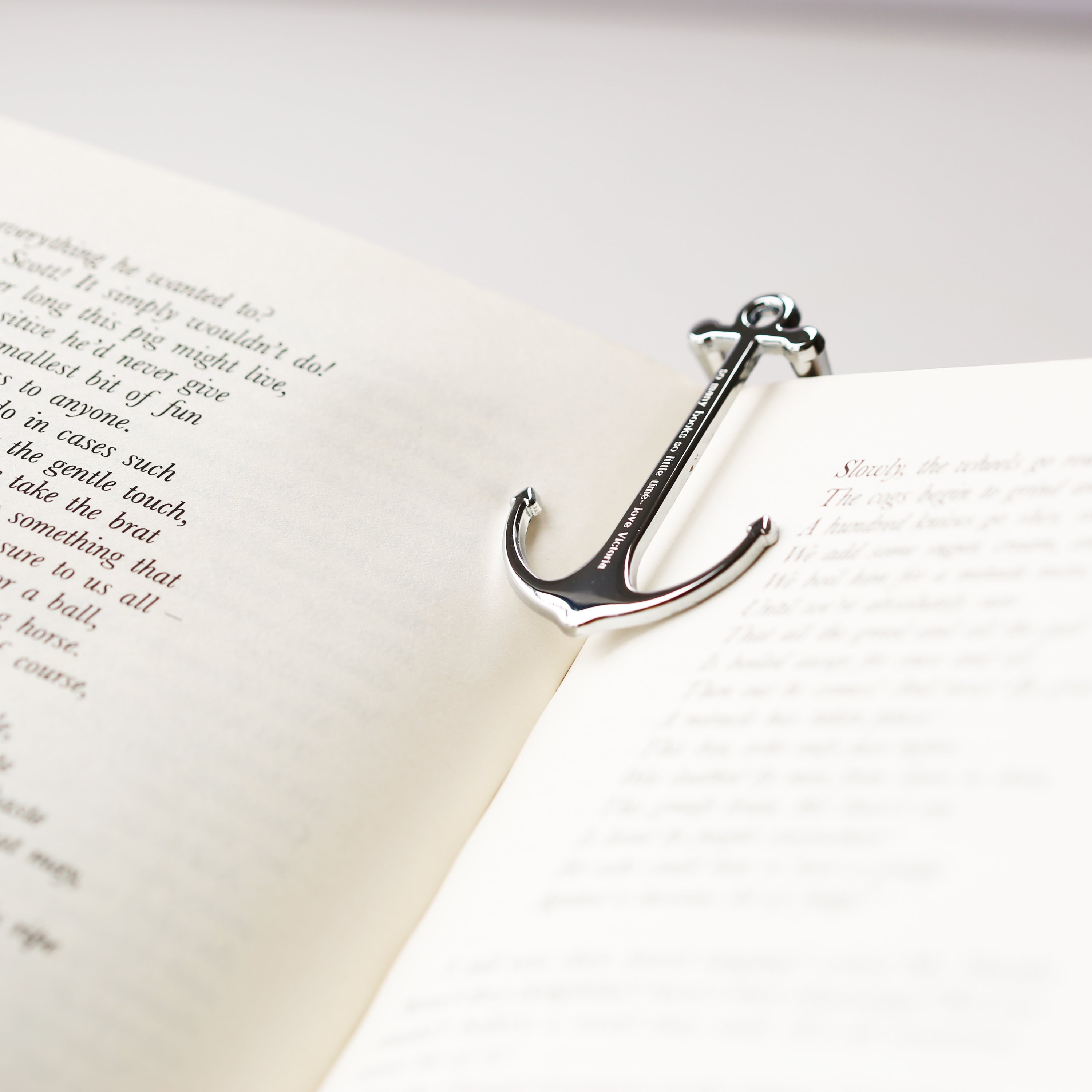 Personalised Silver & Black Book Anchor, elegantly designed with a modern font engraving, perfect for holding books open.