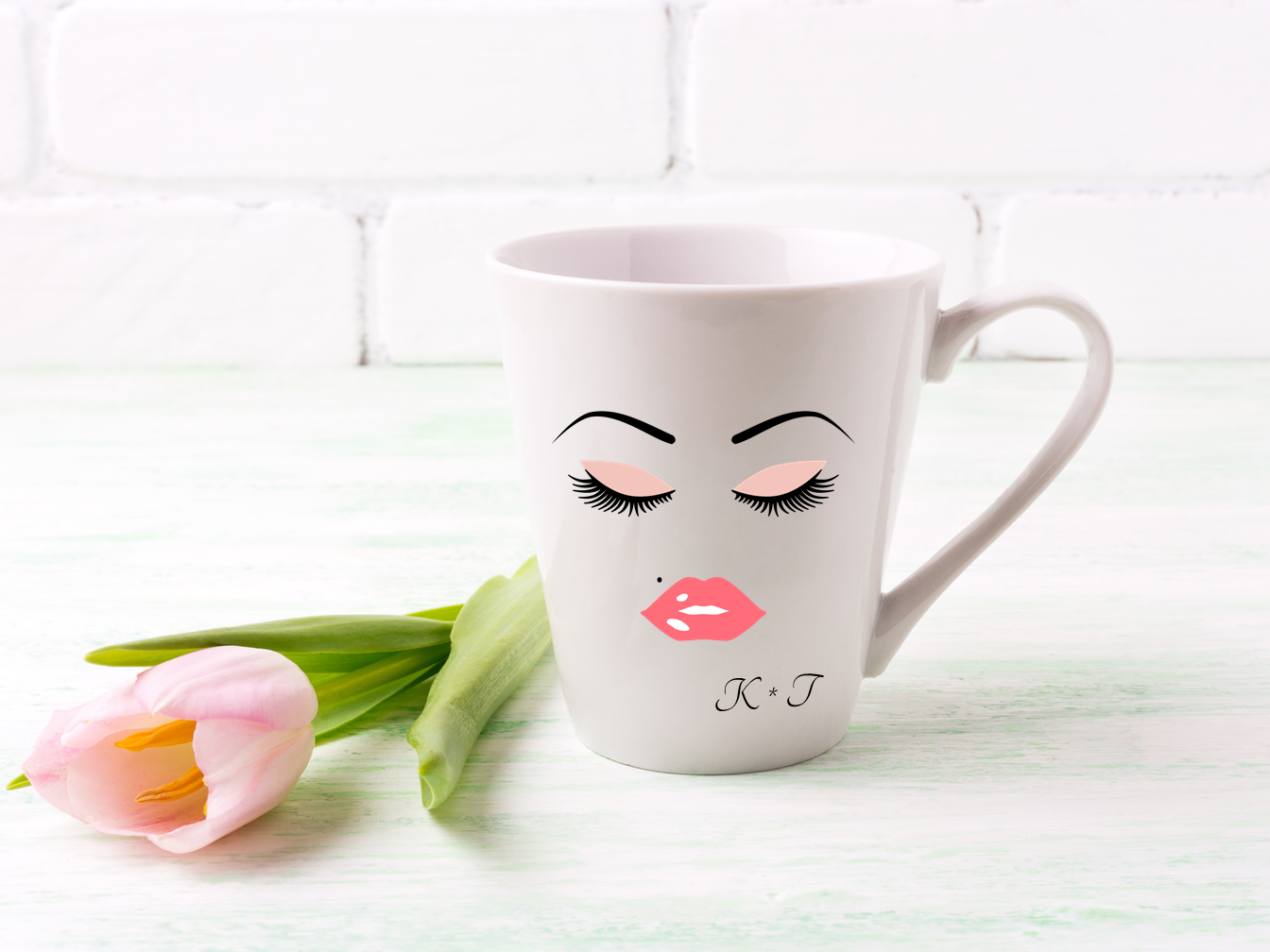 A beautifully crafted Lashes and Lips Personalised Latte Mug featuring a stylish design, customizable with names, perfect for gifting.