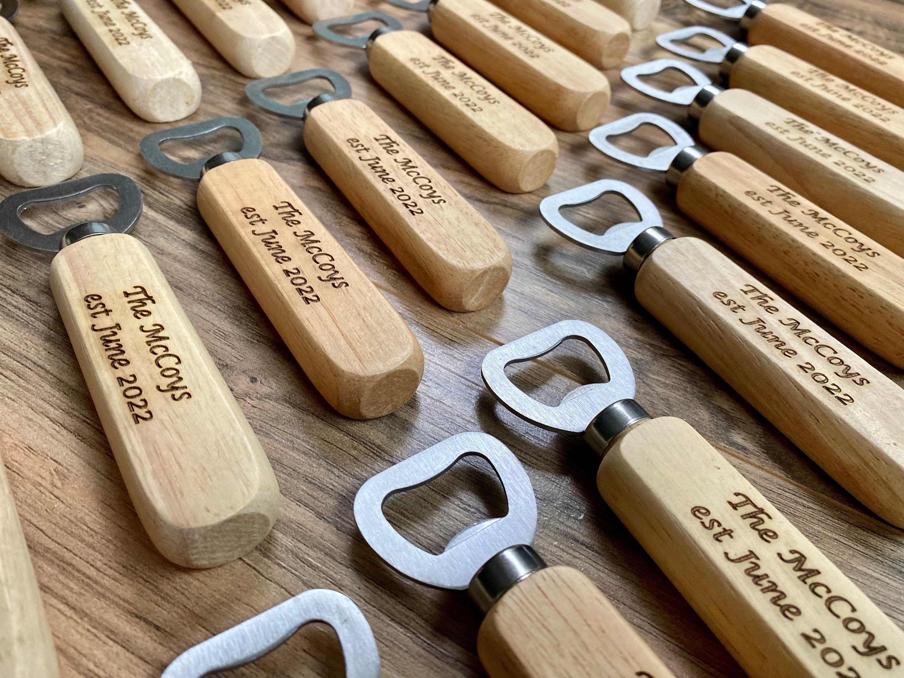 Custom engraved wooden bottle opener with stainless steel cap remover, showcasing personalized engraving.