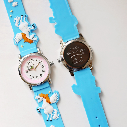 Light blue engraved kids 3D unicorn watch with rotating second hand and personalized message option.