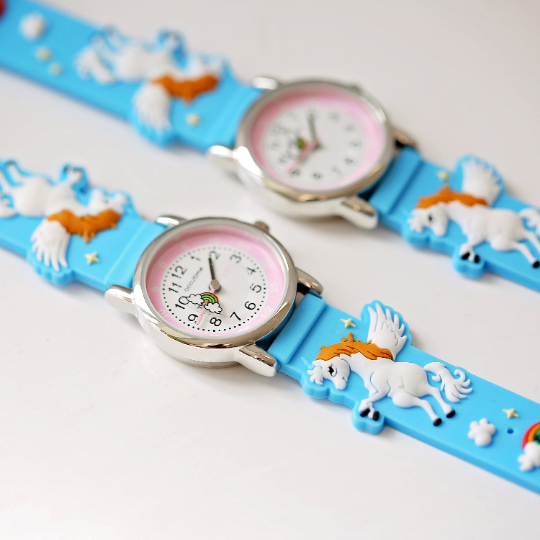 Light blue engraved kids 3D unicorn watch with rotating second hand and personalized message option.