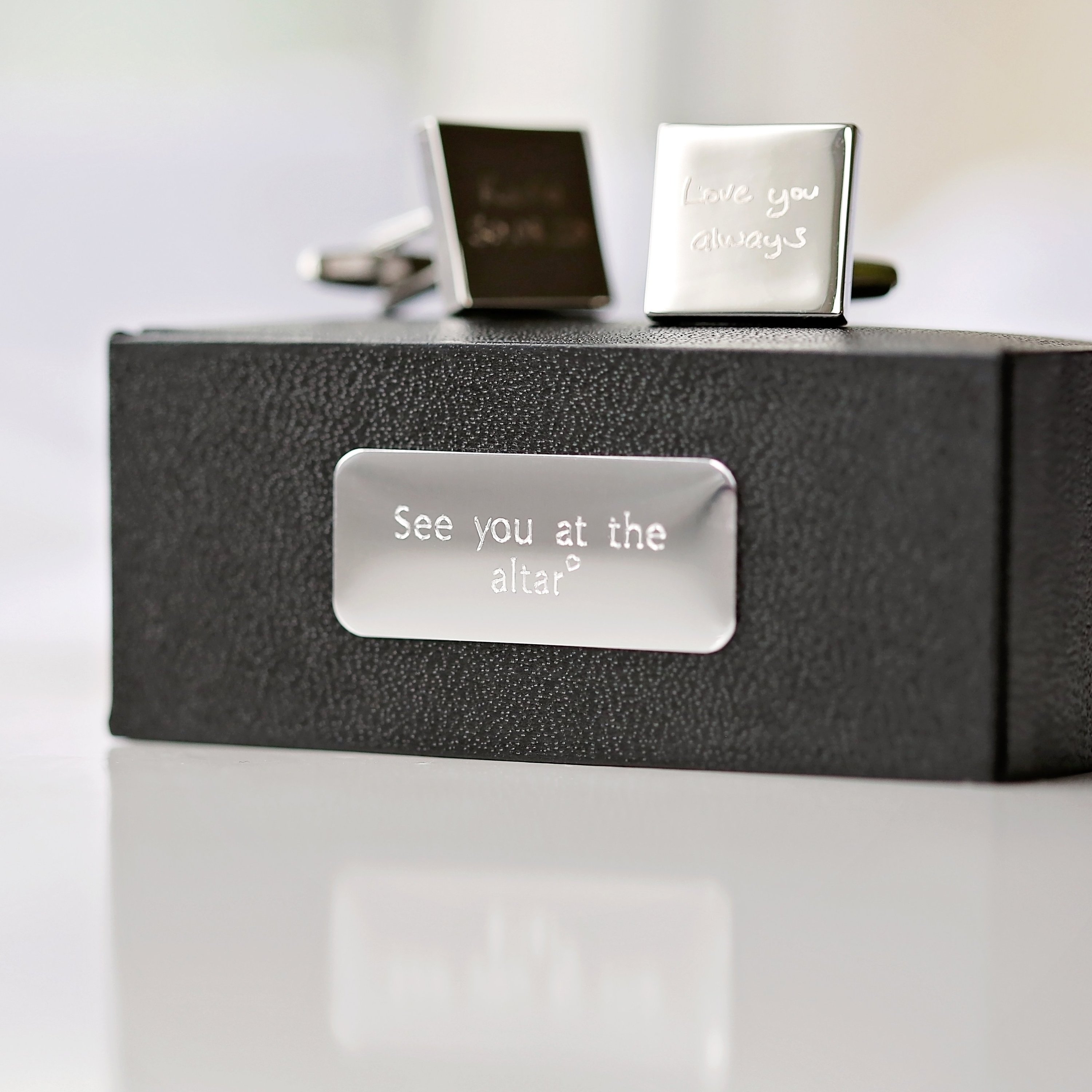 Engraved cufflinks featuring personalized handwriting in a stylish design, made from polished stainless steel.