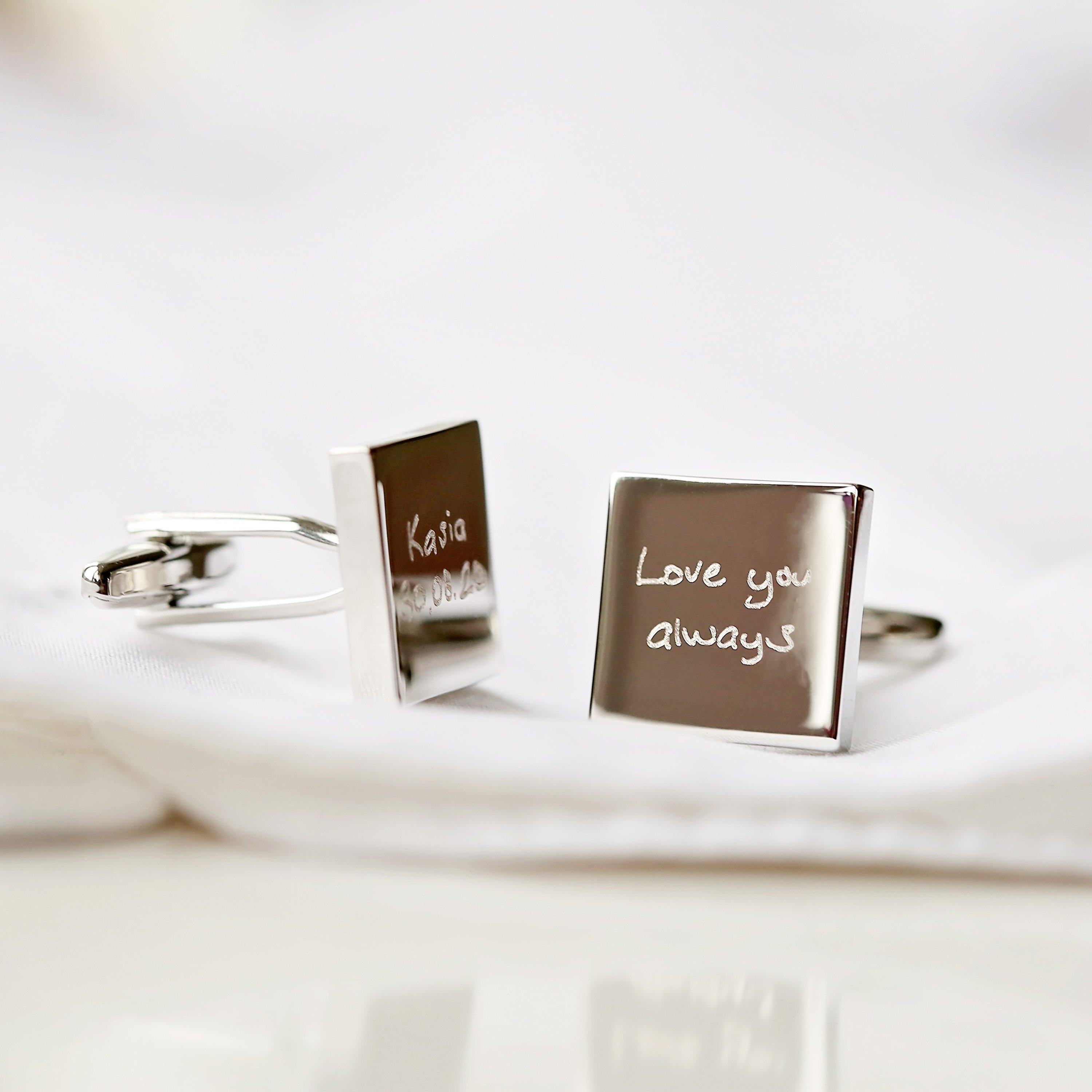 Engraved cufflinks featuring personalized handwriting in a stylish design, made from polished stainless steel.