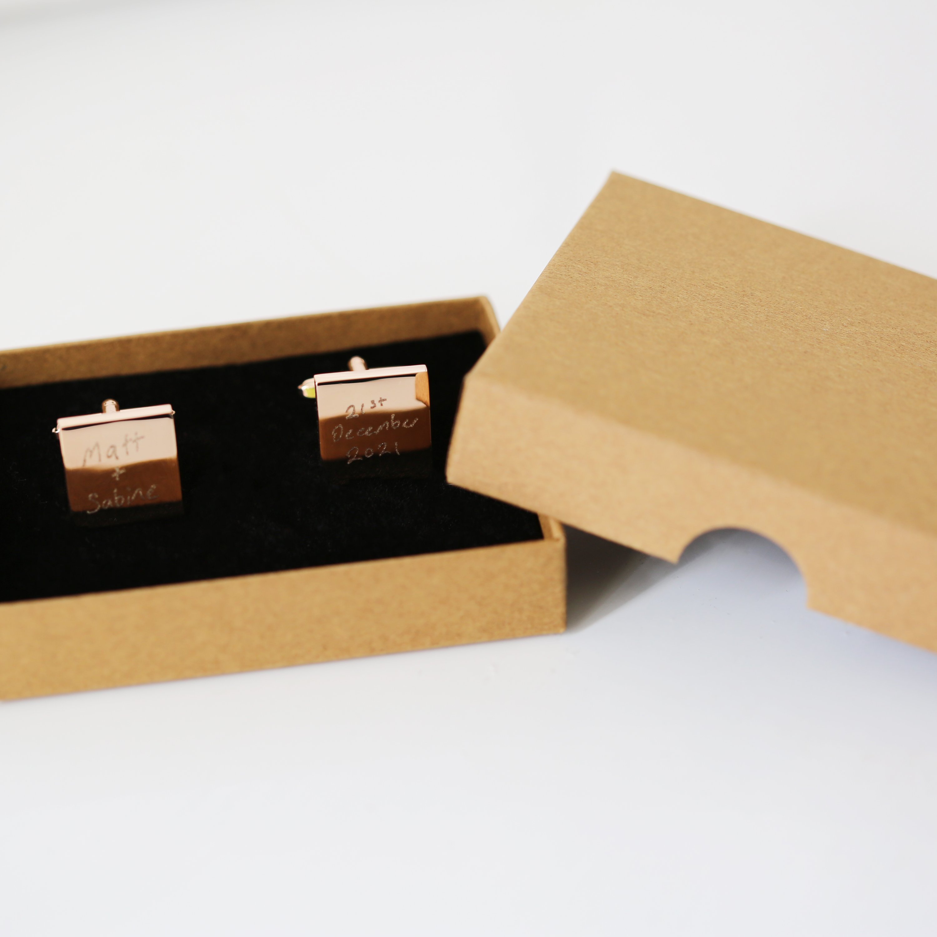 Engraved cufflinks featuring personalized handwriting in a stylish design, made from polished stainless steel.