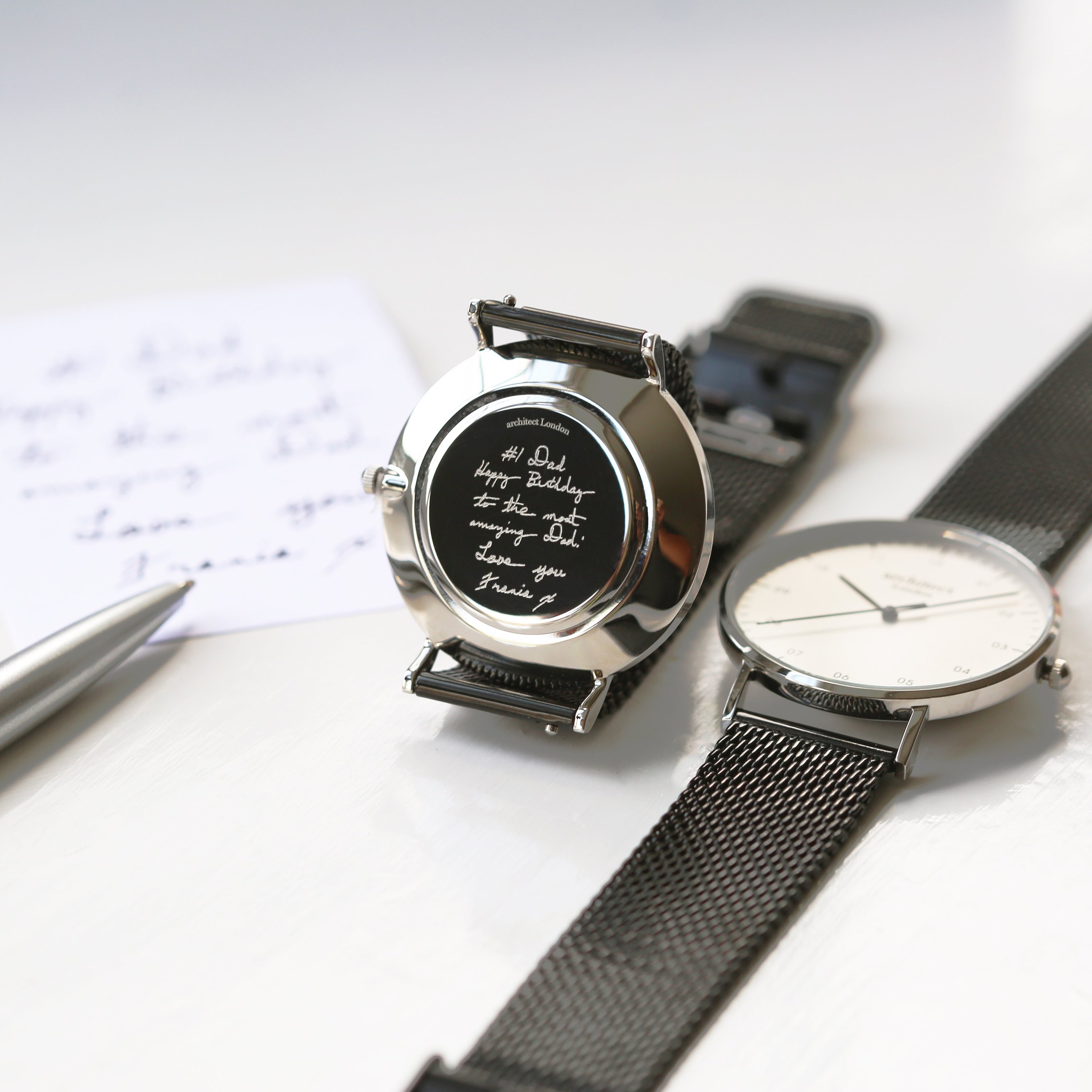 Men's Architect Zephyr watch with Pitch Black Mesh strap, featuring personalized handwriting engraving on the back.