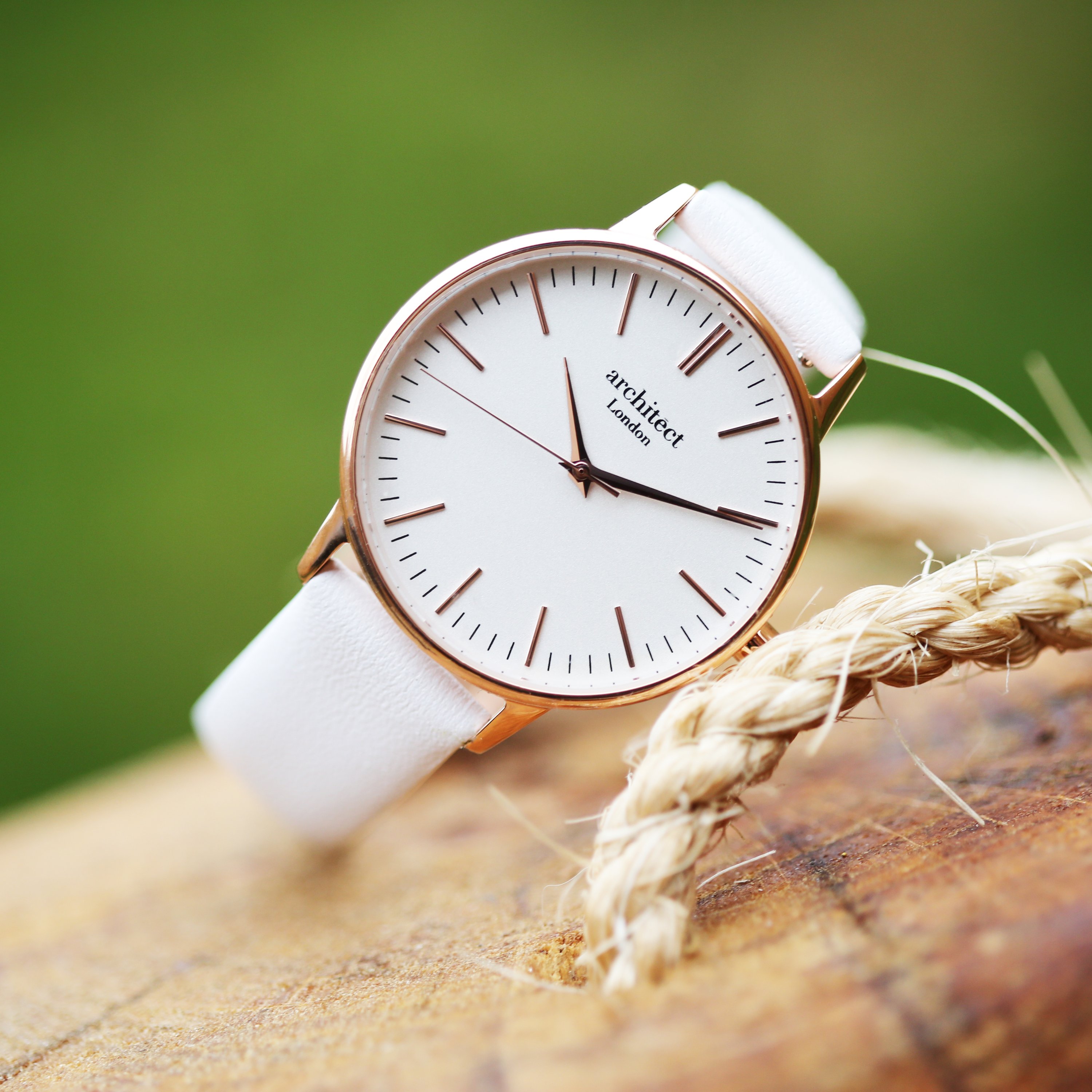 Ladies Architēct Blanc watch featuring a white genuine leather strap and personalized handwriting engraving on the back.