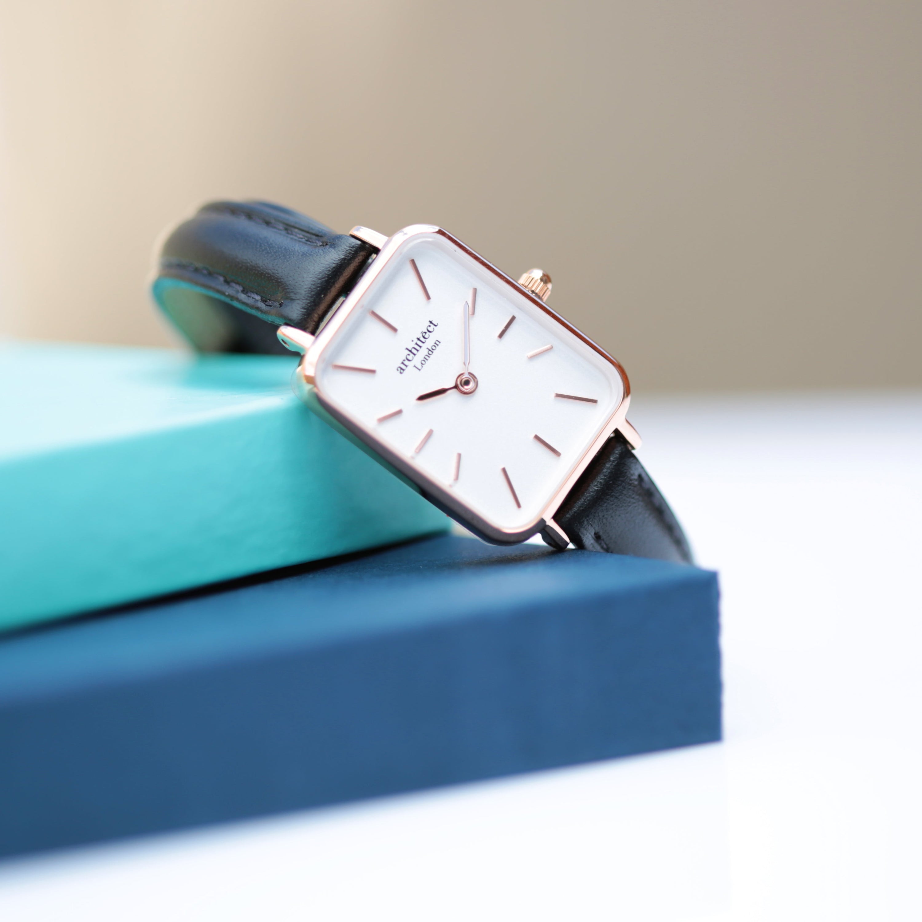 Ladies Architēct Lille watch in Brilliant White with a modern font engraving on the back, featuring a stainless steel case and genuine leather strap.