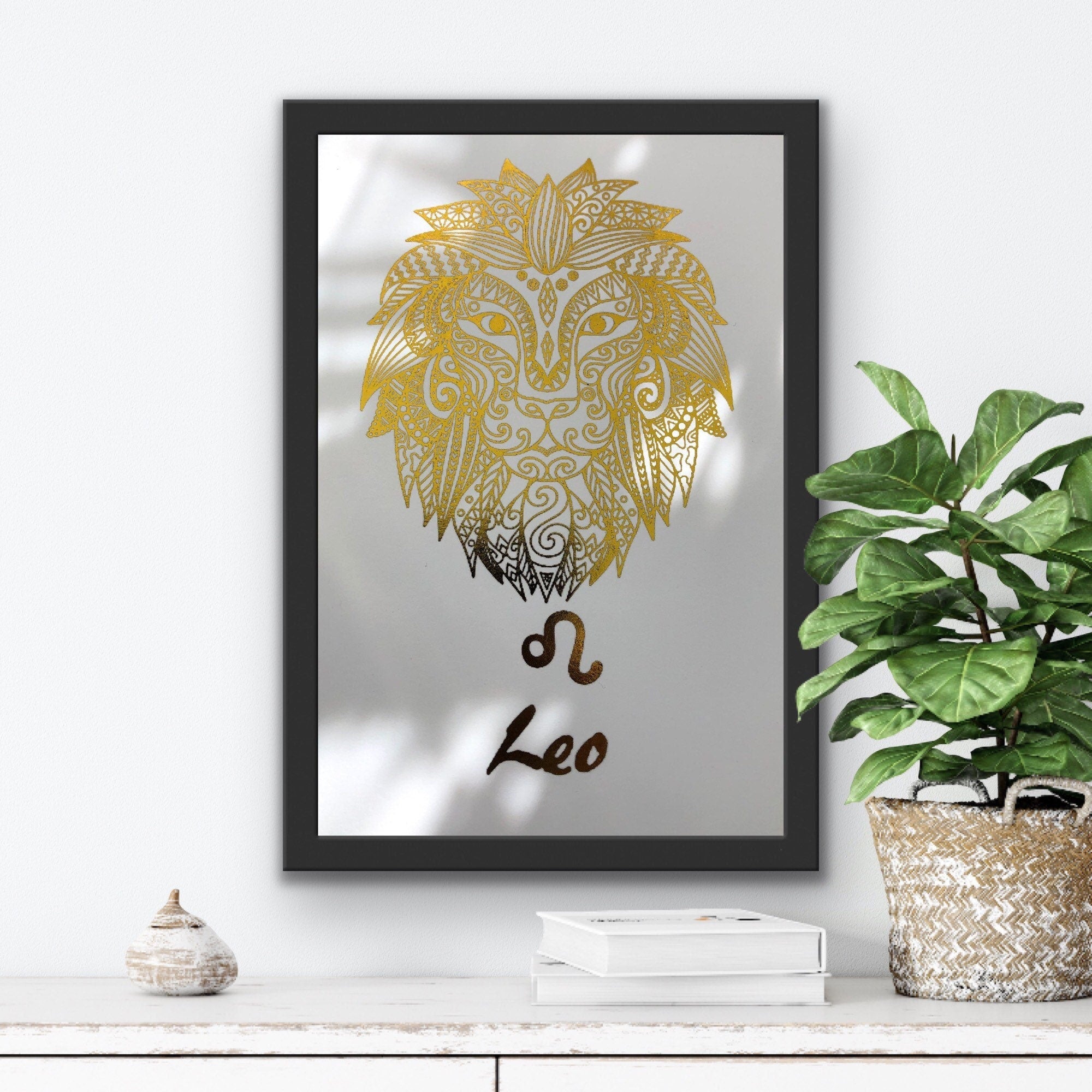 A beautiful Leo Star Sign Foil Print featuring a majestic lion symbol, showcasing vibrant colors and a luxurious foil finish.