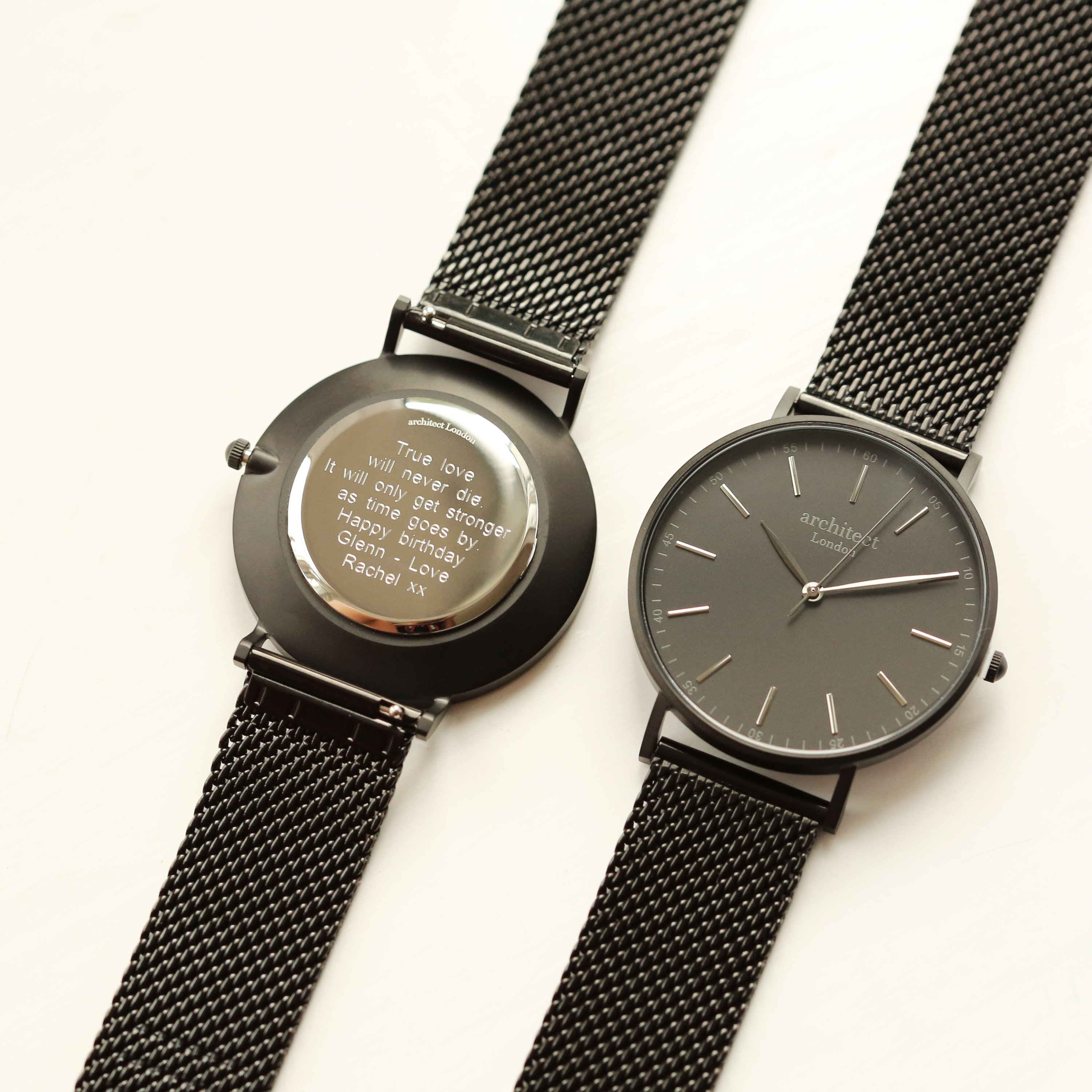 Modern Font Engraving Men's Minimalist Watch with pitch black mesh strap, showcasing a sleek stainless steel case and elegant design.