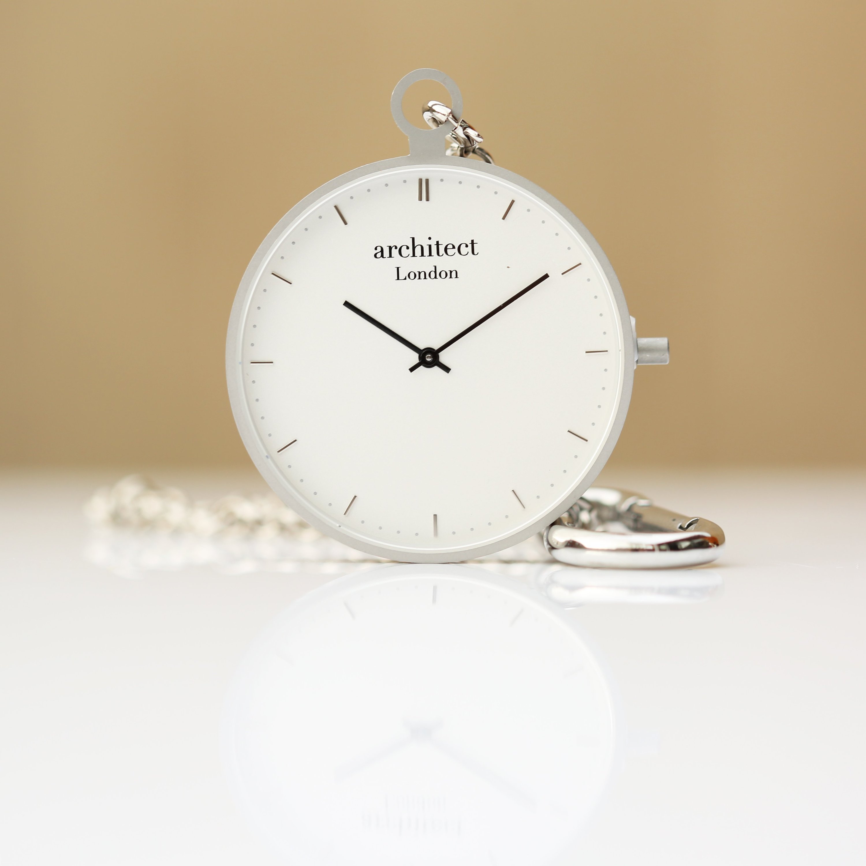 Minimalist white pocket watch.