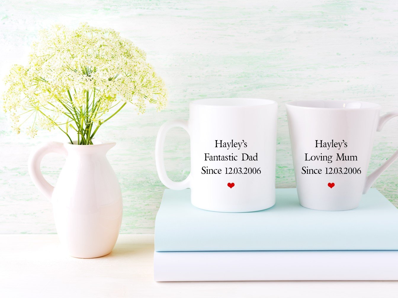 Personalised Mum & Dad mug set featuring a standard and latte mug, beautifully designed with custom names and dates.