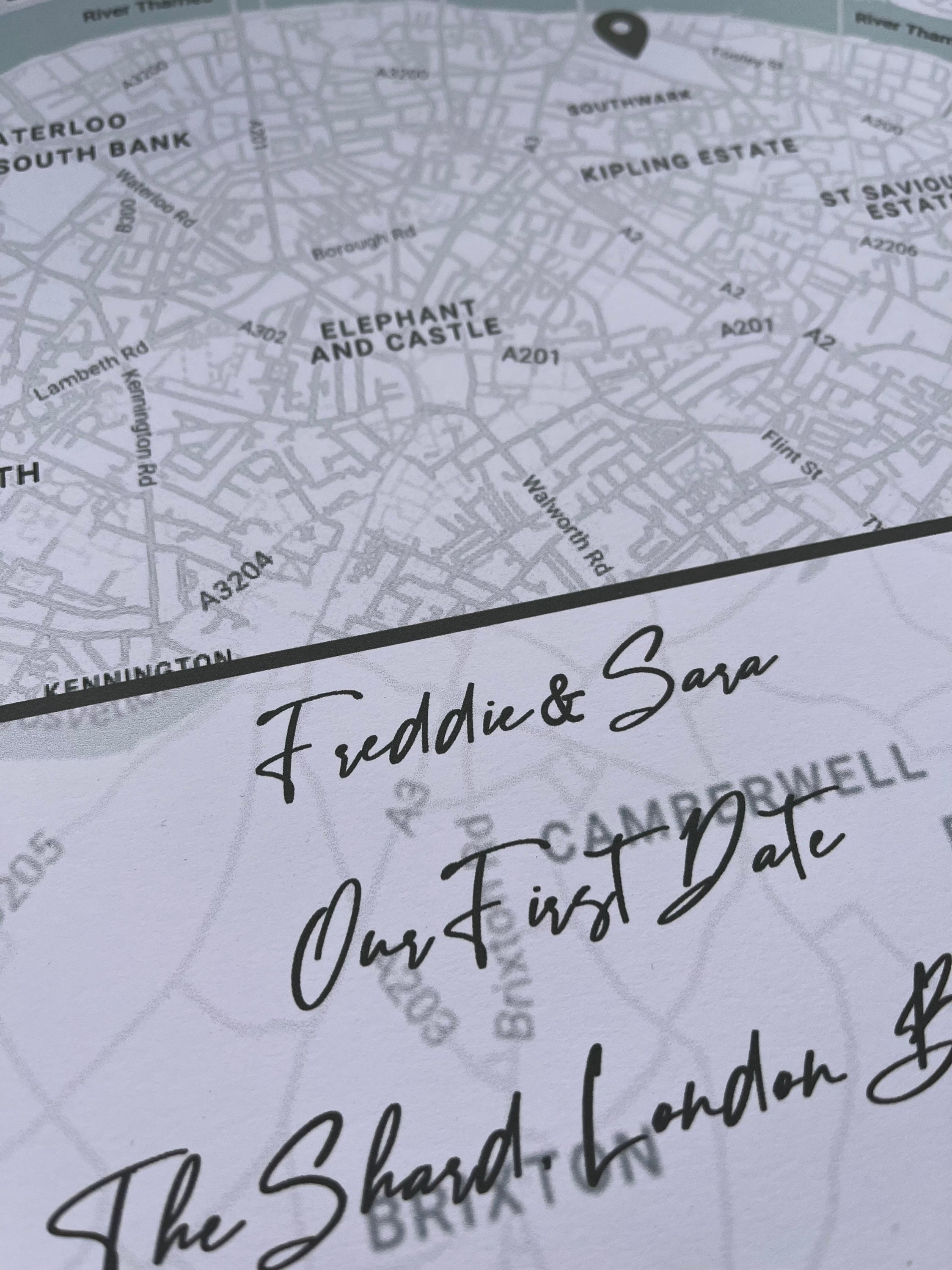 A beautifully crafted First Date Map in elegant greys, showcasing the location of a couple's first date with significant landmarks.