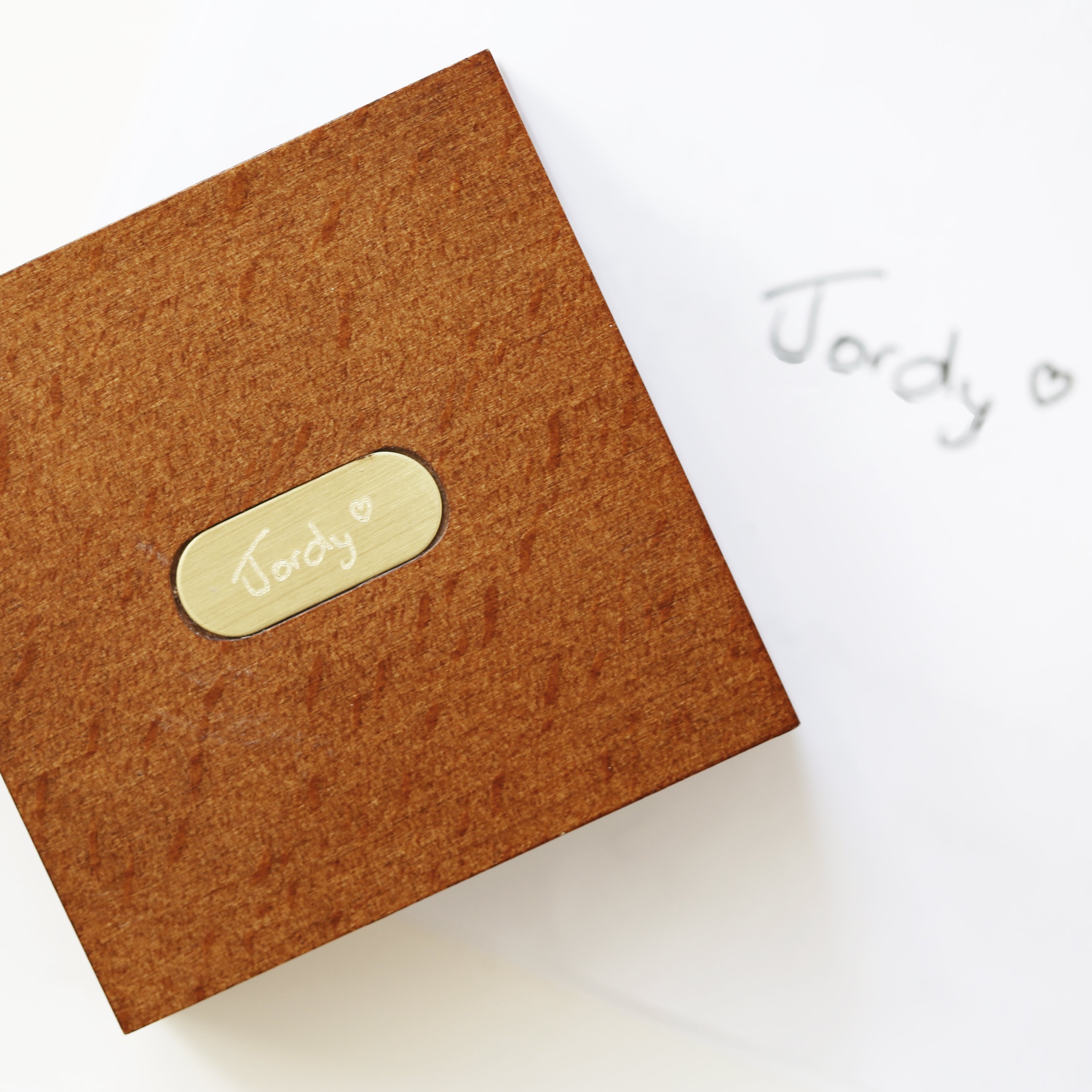 Personalised brass compass in a mahogany timber box, featuring custom handwriting engraving.