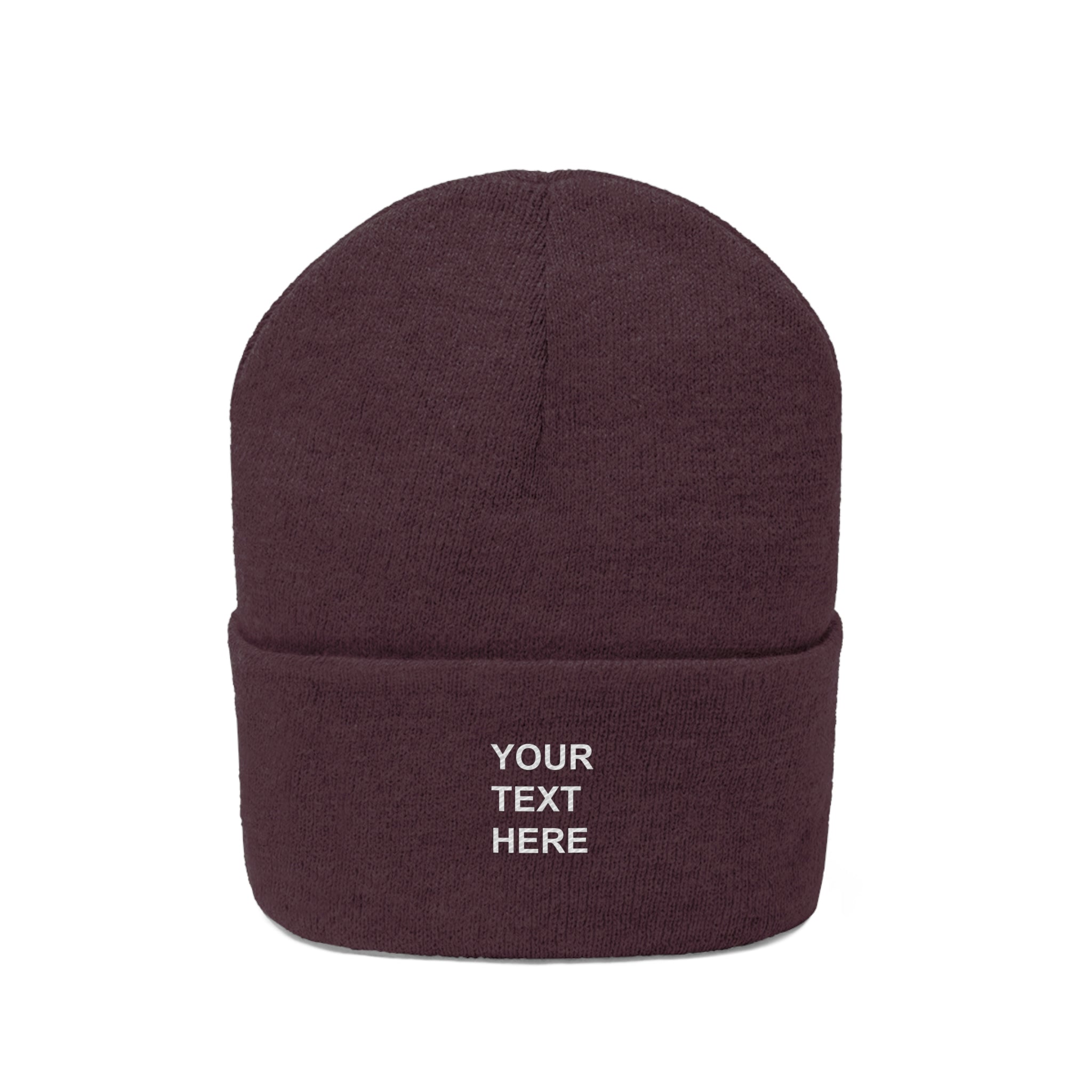 A cozy personalized knit beanie in various colors, featuring custom text options for a unique touch.