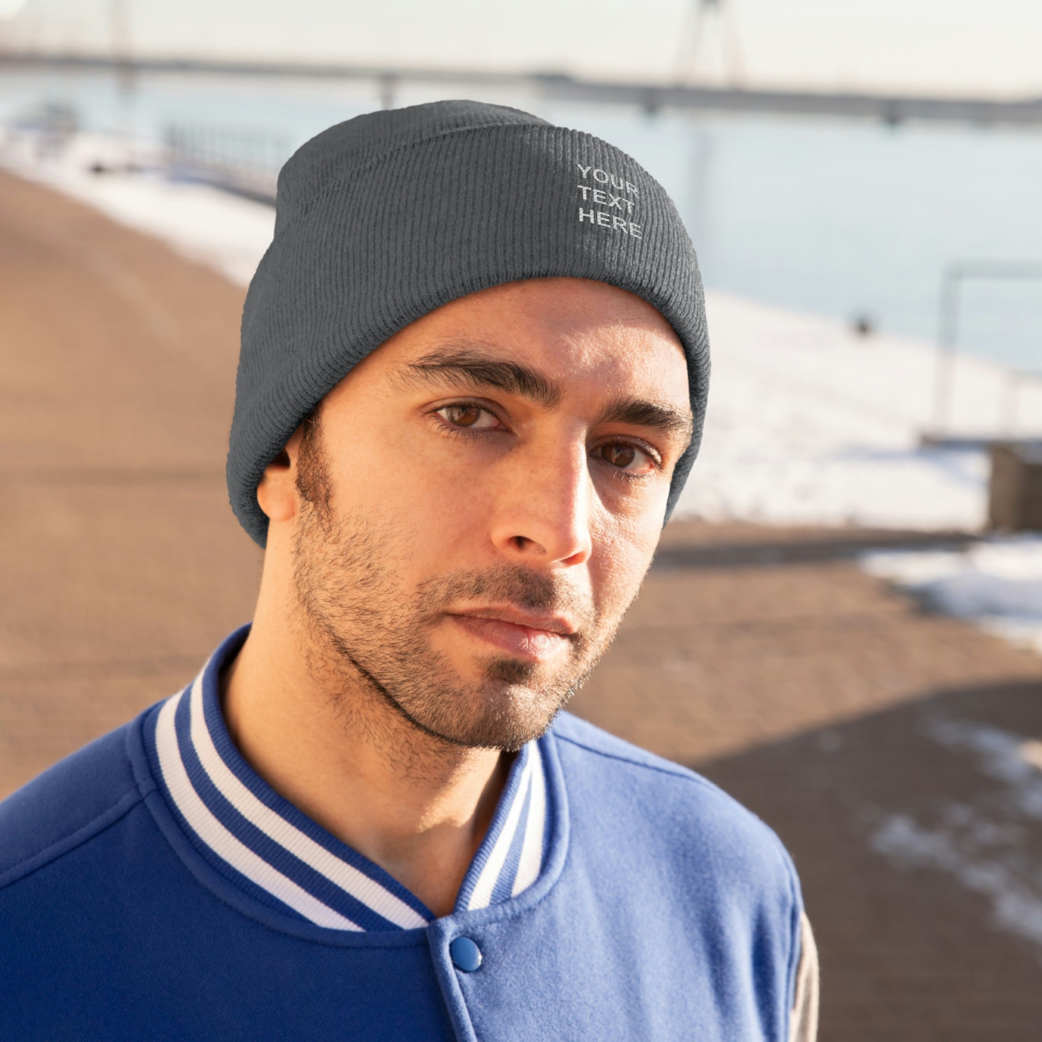 A cozy personalized knit beanie in various colors, featuring custom text options for a unique touch.