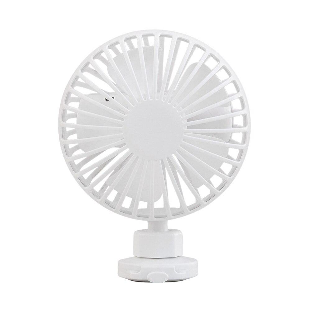 Portable USB fan with wrist strap in various colors, designed for indoor and outdoor use, featuring adjustable wind speeds and aromatherapy function.