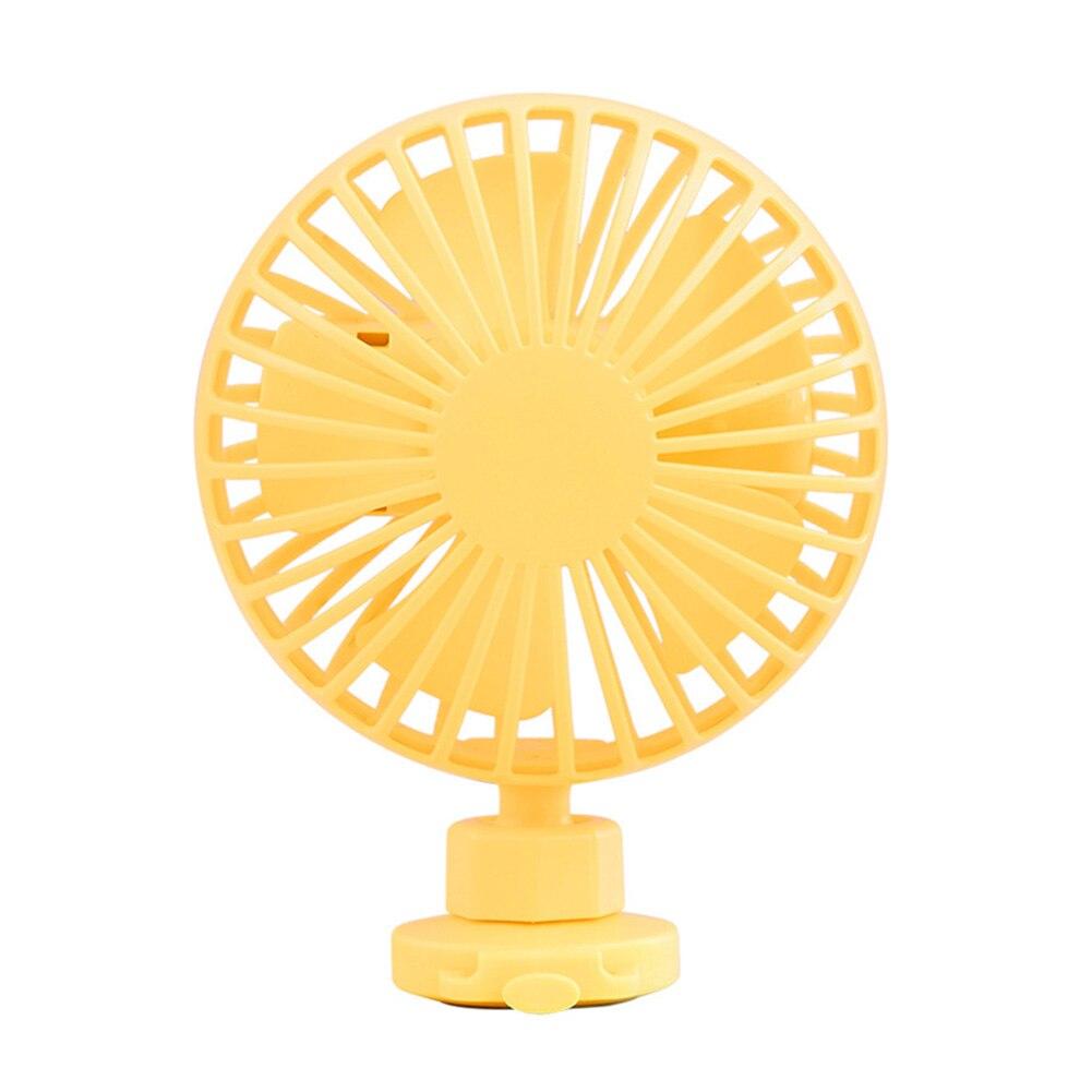 Portable USB fan with wrist strap in various colors, designed for indoor and outdoor use, featuring adjustable wind speeds and aromatherapy function.