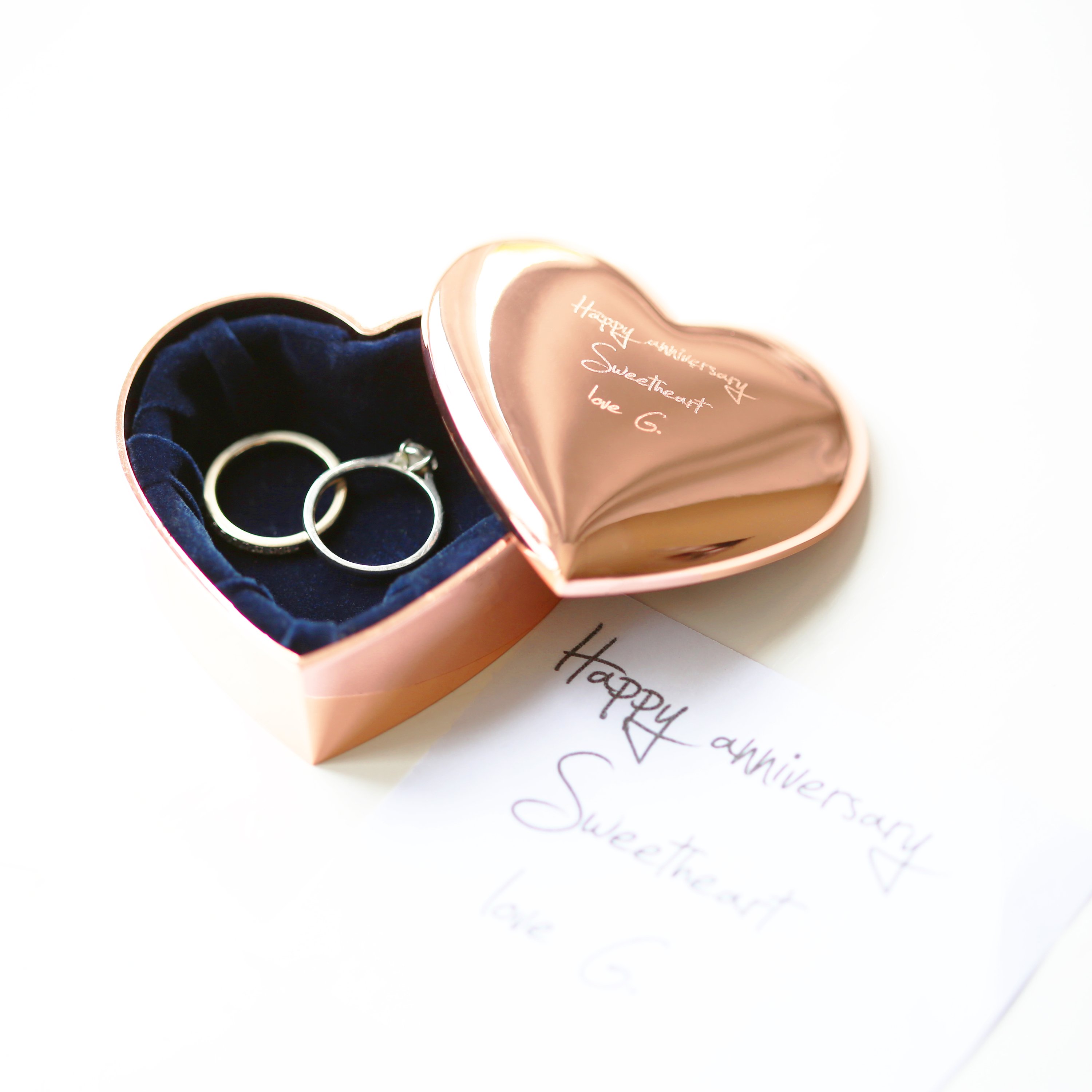 A beautiful rose gold heart keepsake personalized with handwriting, showcasing its elegant design and sentimental value.