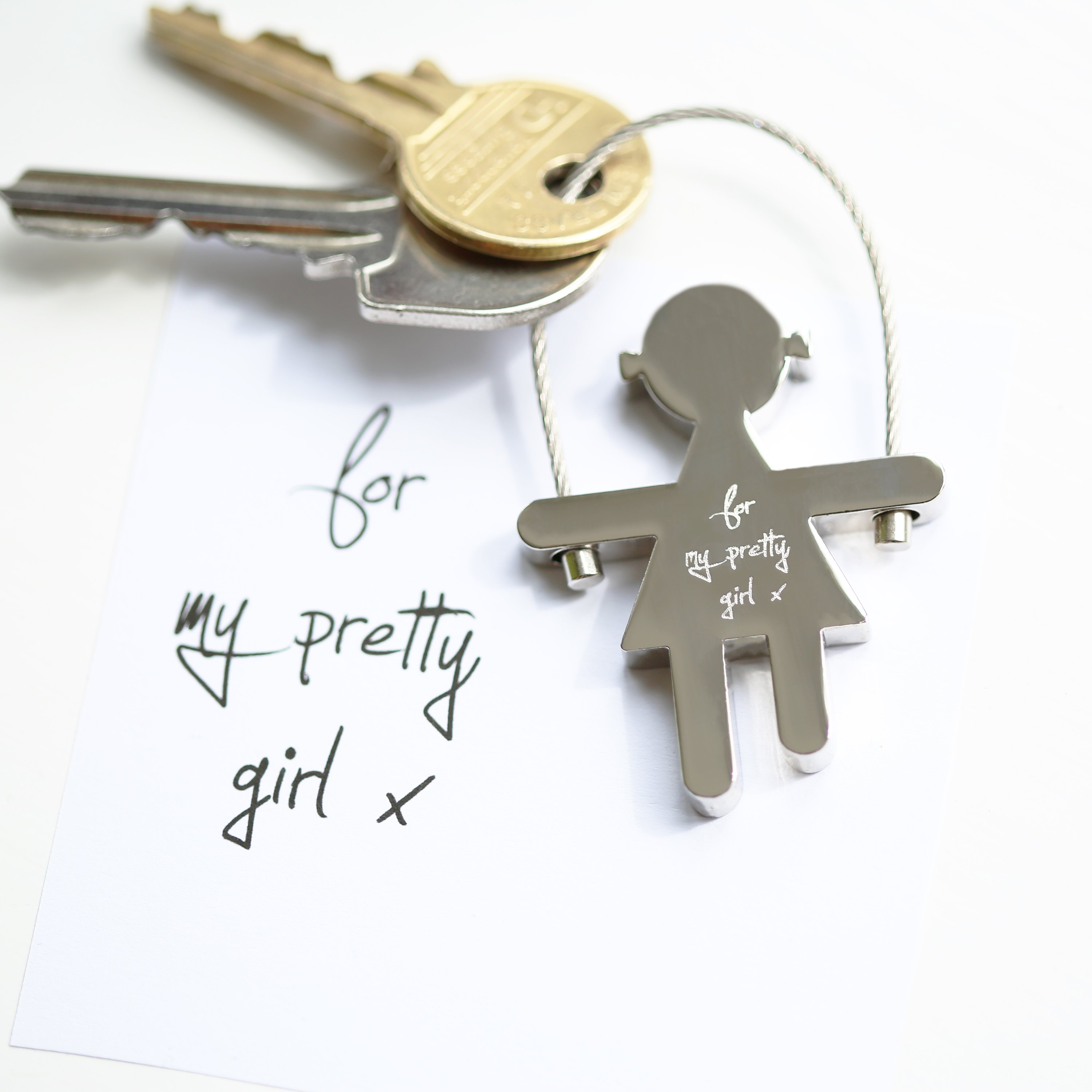 Personalised Skipping Sally Key Ring with custom handwriting engraving on stainless steel, featuring a unique skipping rope design.