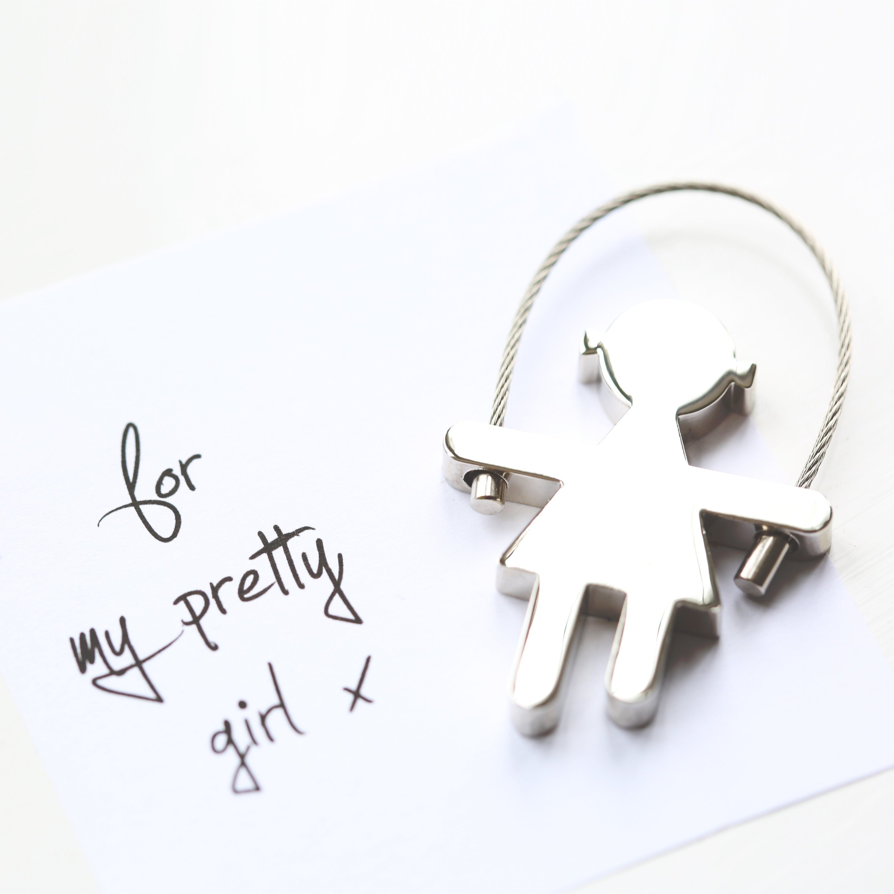 Personalised Skipping Sally Key Ring with custom handwriting engraving on stainless steel, featuring a unique skipping rope design.