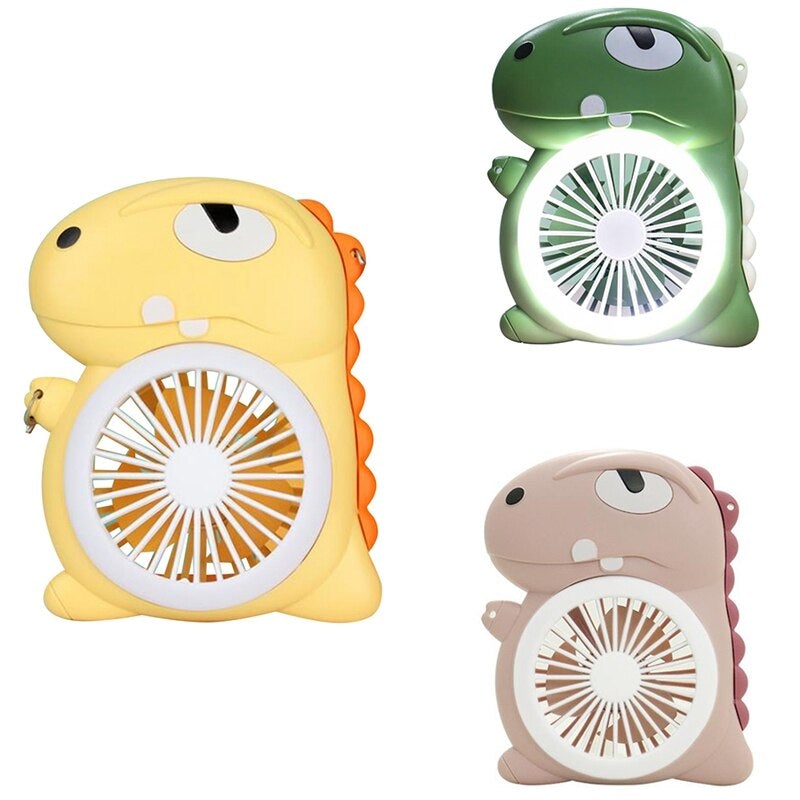 Small USB Desk Handheld Portable Personal Cooling Air Fan in dinosaur shape, available in yellow, green, and pink colors, with a USB cable and lanyard.