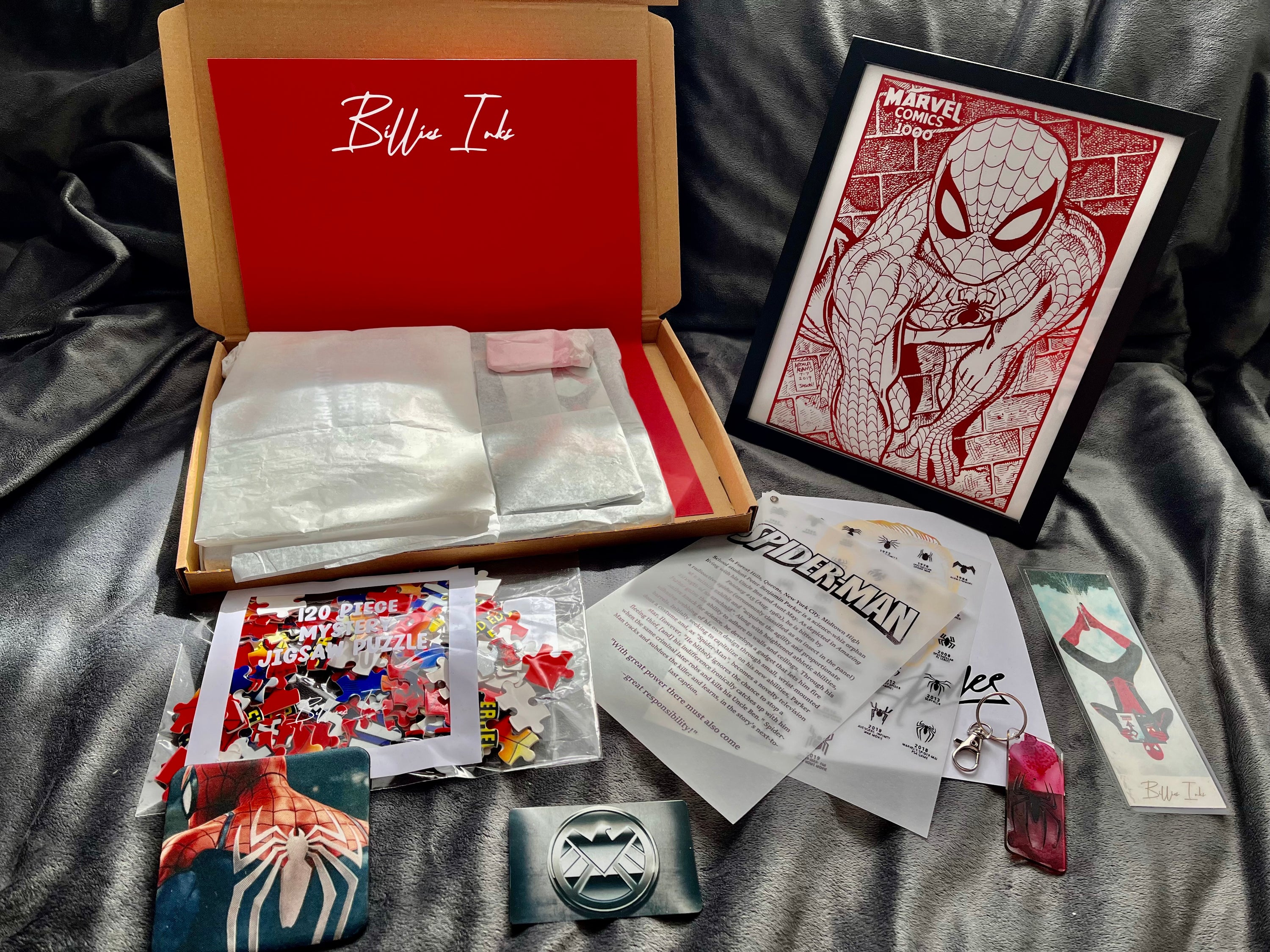 Ultimate Spider-Man Gift Set Part 2 featuring framed comic print, bookmark, keyring, coaster, jigsaw puzzle, and educational materials.