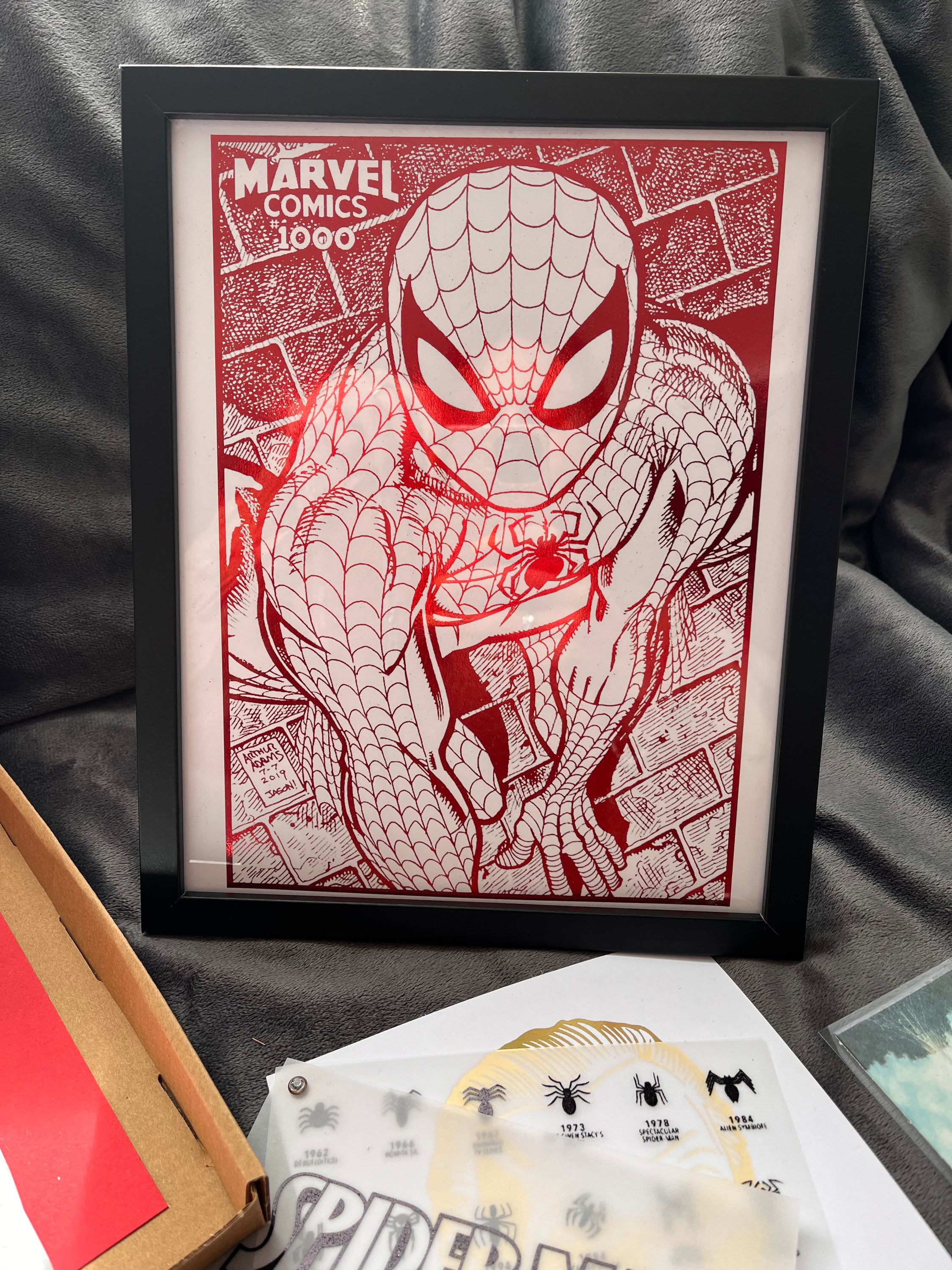 Ultimate Spider-Man Gift Set Part 2 featuring framed comic print, bookmark, keyring, coaster, jigsaw puzzle, and educational materials.