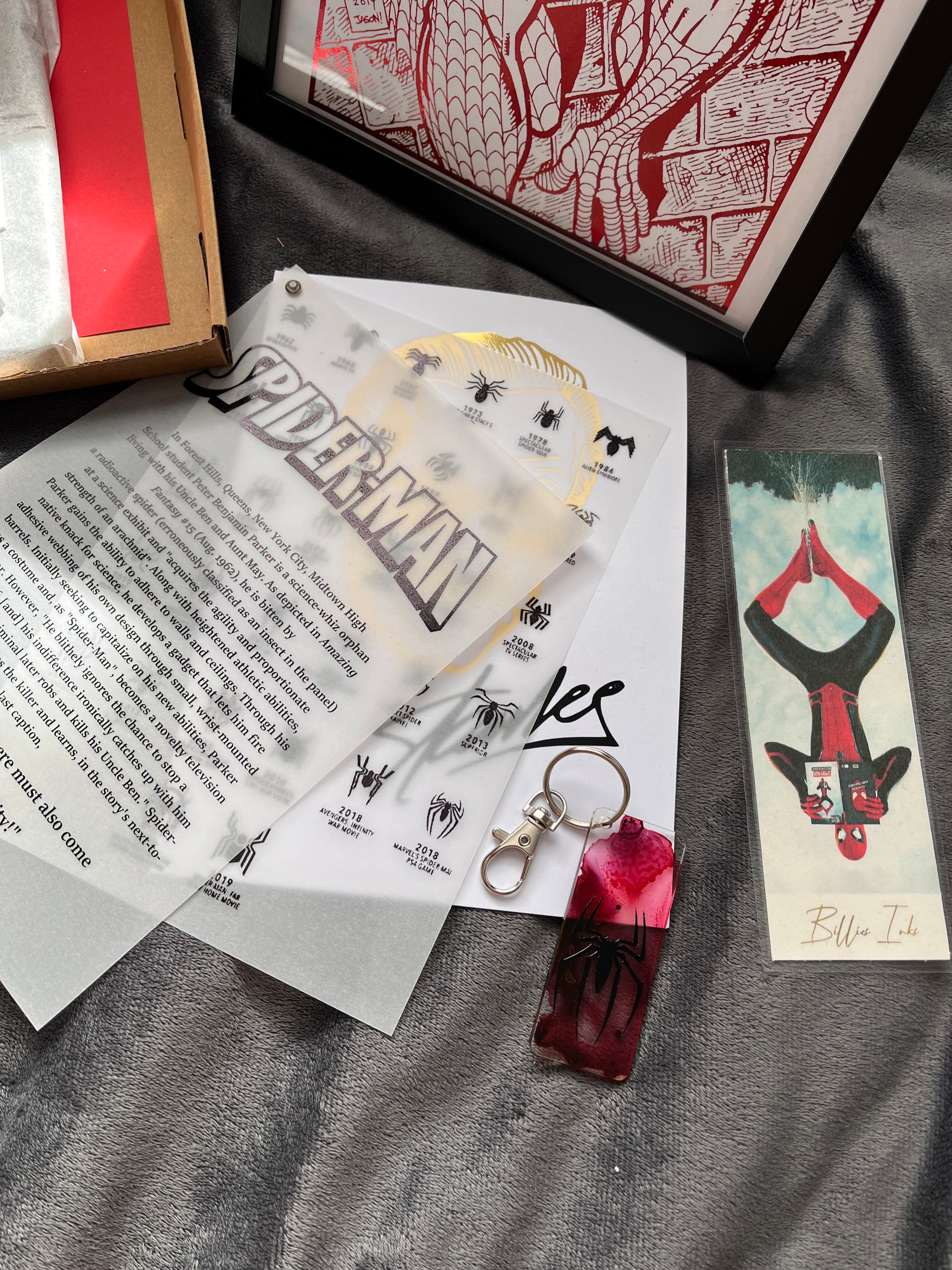 Ultimate Spider-Man Gift Set Part 2 featuring framed comic print, bookmark, keyring, coaster, jigsaw puzzle, and educational materials.