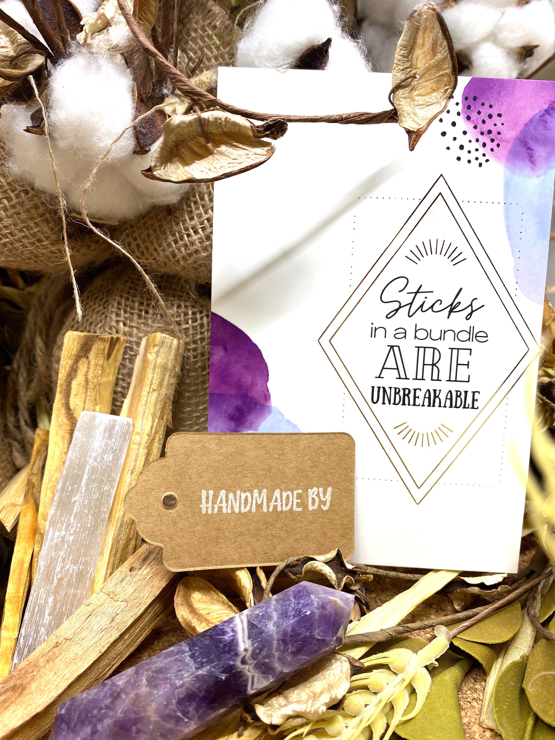 Sunsum® Power of Three Kit featuring an Obsidian Wand, Selenite Wand, Amethyst Wand, and six Palo Santo incense sticks in an elegant gift box.