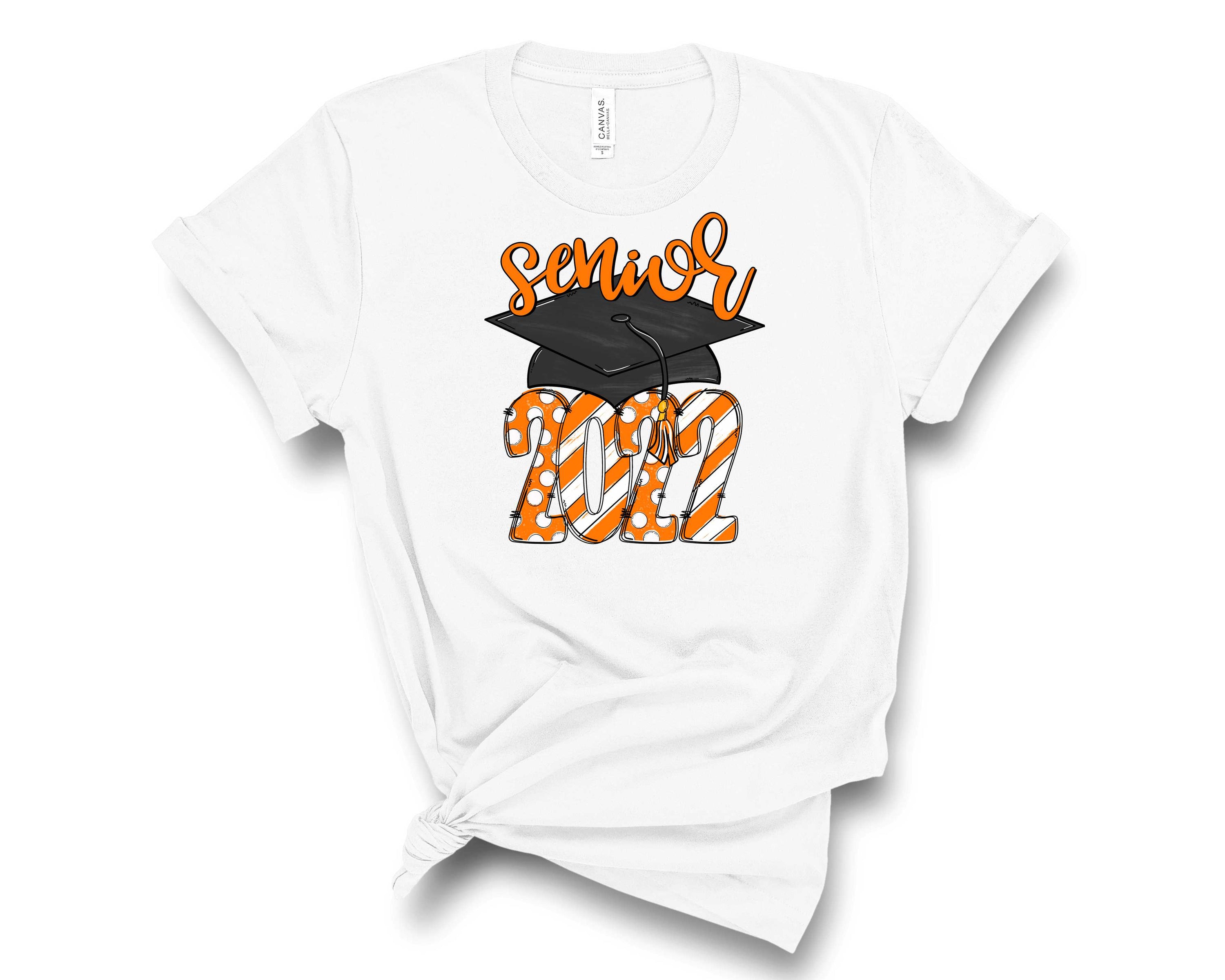 2022 Cap Orange Graphic Tee featuring a vibrant orange color and trendy graphic design, suitable for unisex wear.