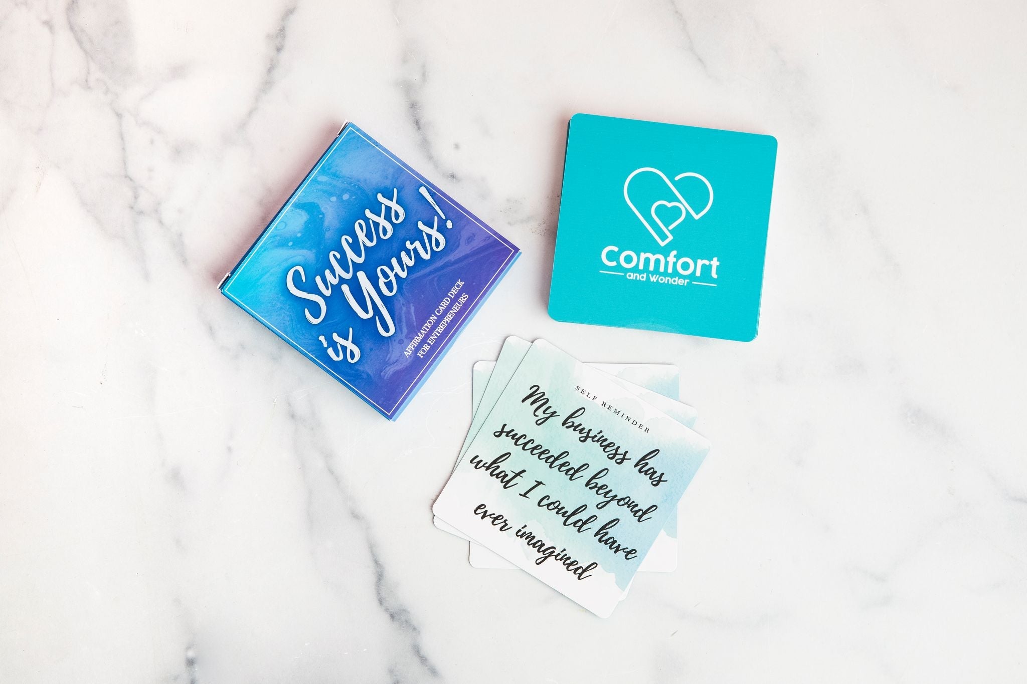 A beautifully designed set of 30 affirmation cards for entrepreneurs, featuring hand-lettered motivational quotes and vibrant colors.