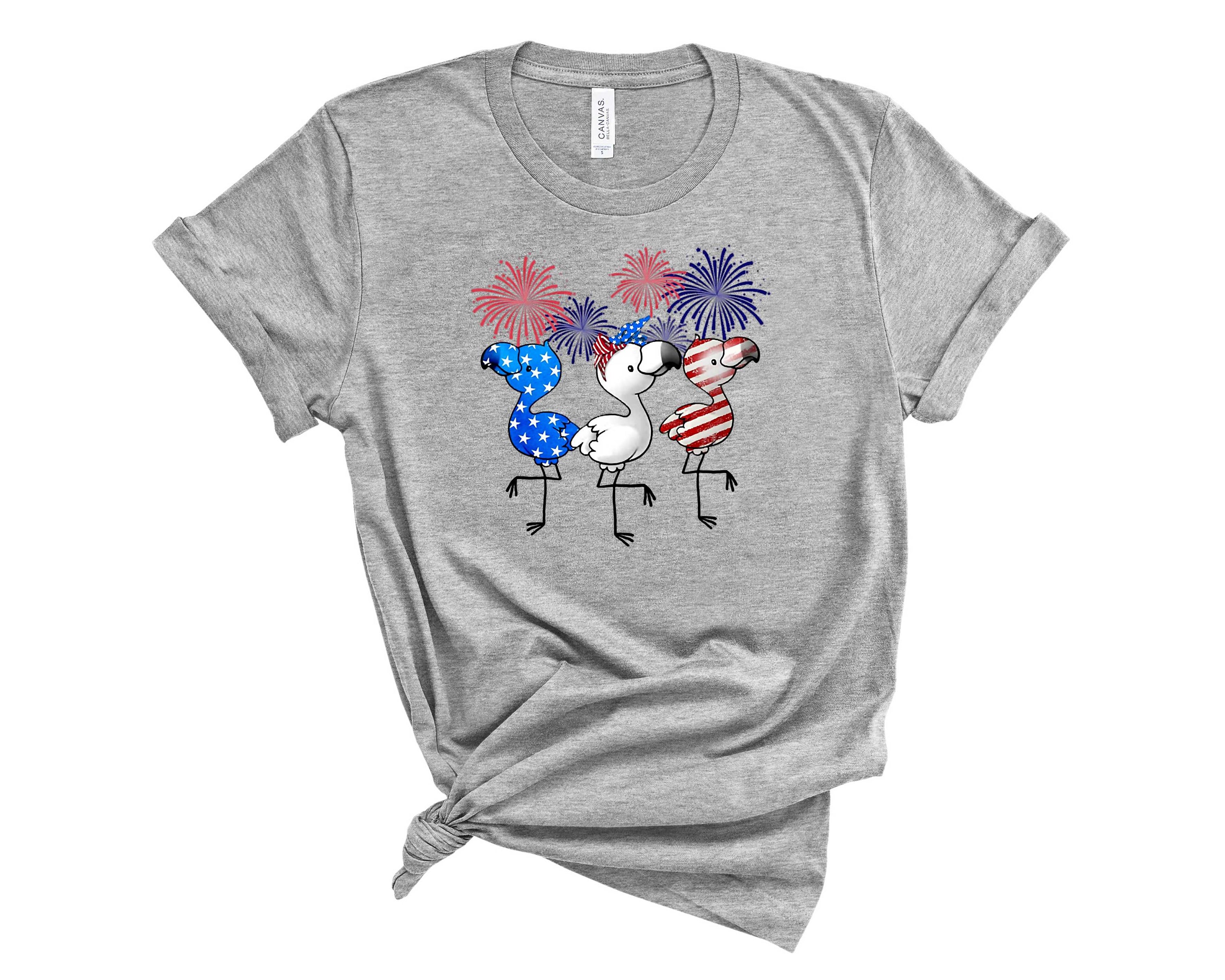 A vibrant America Flamingo Graphic Tee featuring a colorful flamingo design, perfect for casual wear.