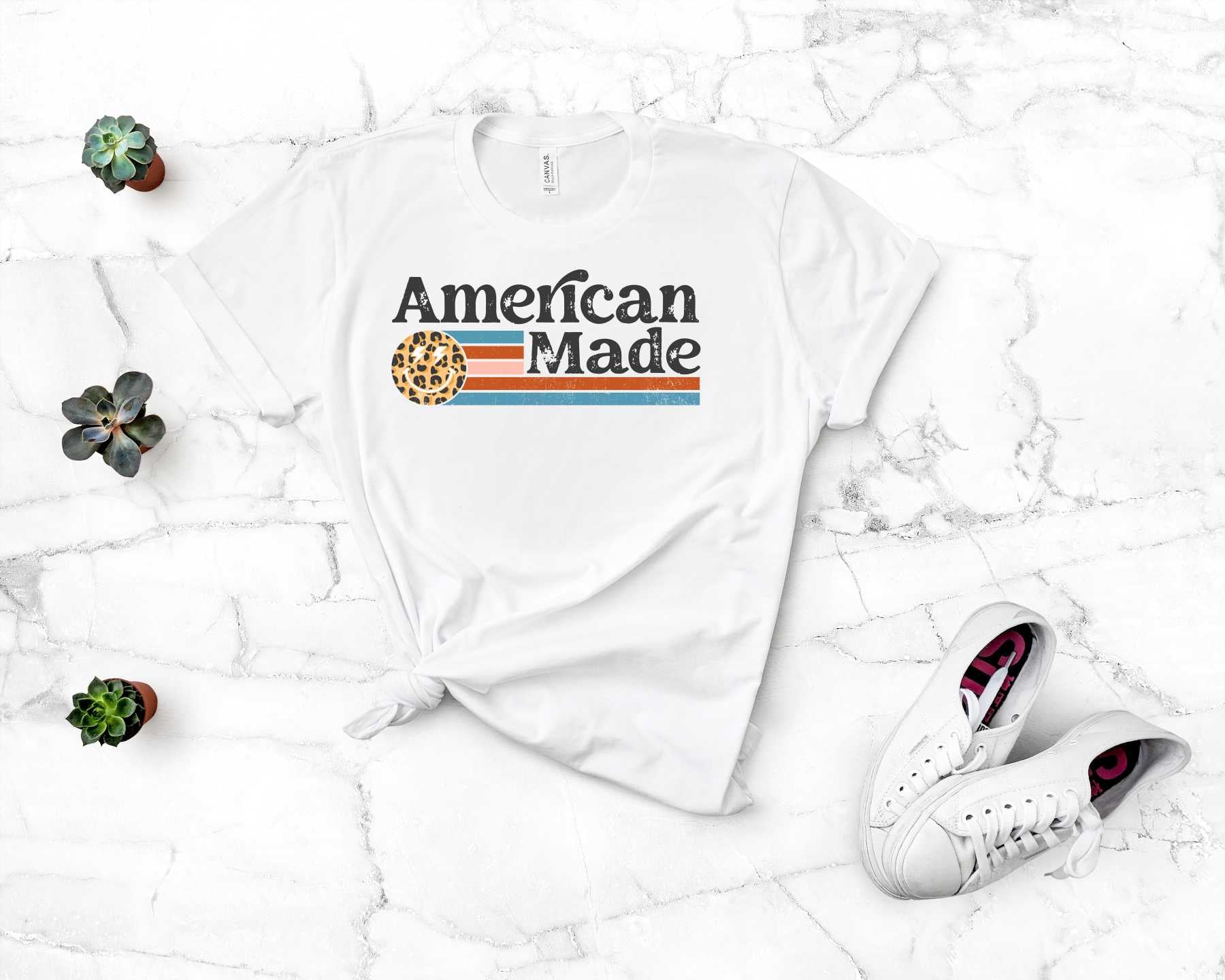 A stylish unisex t-shirt featuring a bold leopard face graphic design, made in the USA.