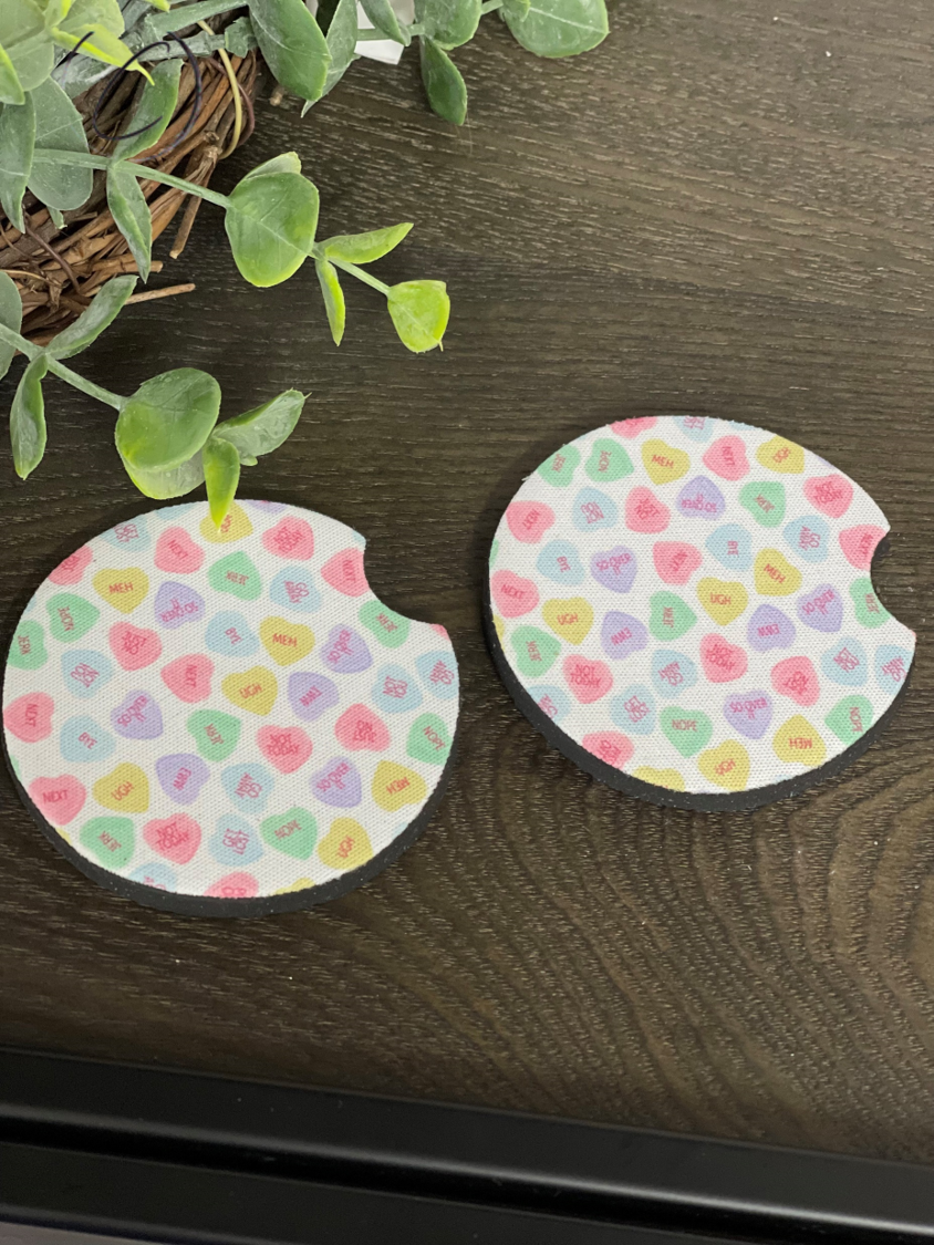 Anti Valentines Conversation Hearts car coaster set featuring colorful heart designs on durable neoprene material, perfect for car cup holders.