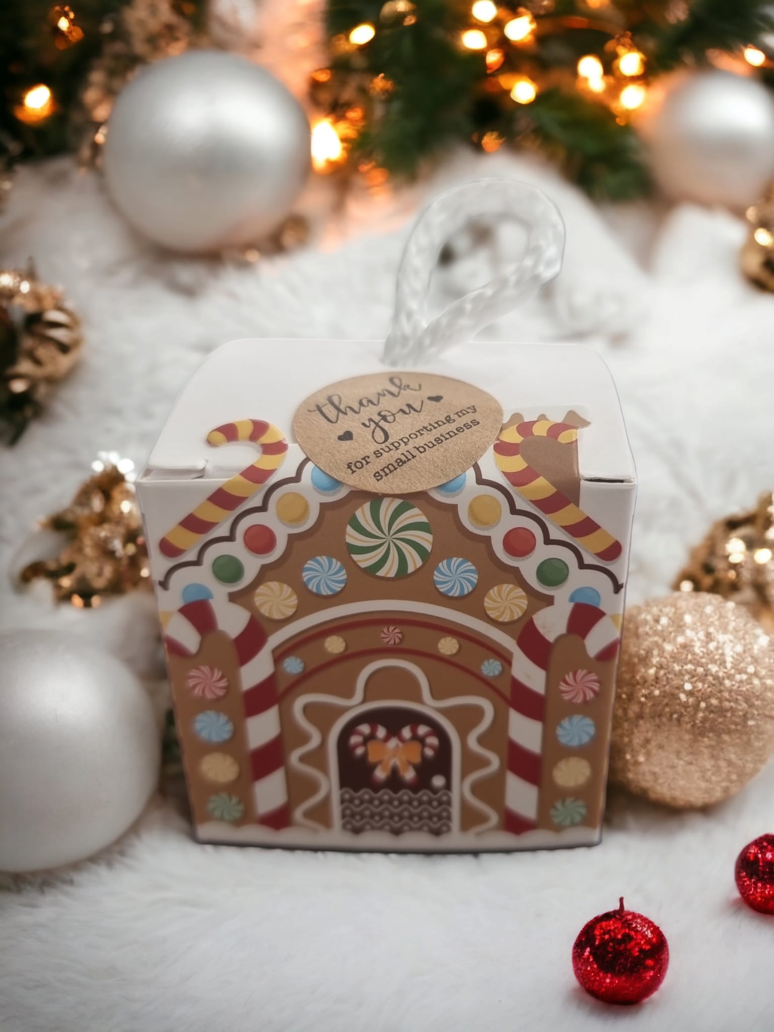 Apple Cinnamon Galaxy Stars Wax Melts in a decorative Christmas tree box, shaped like stars, exuding a warm festive aroma.